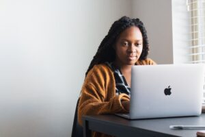 woman on laptop working from home office
