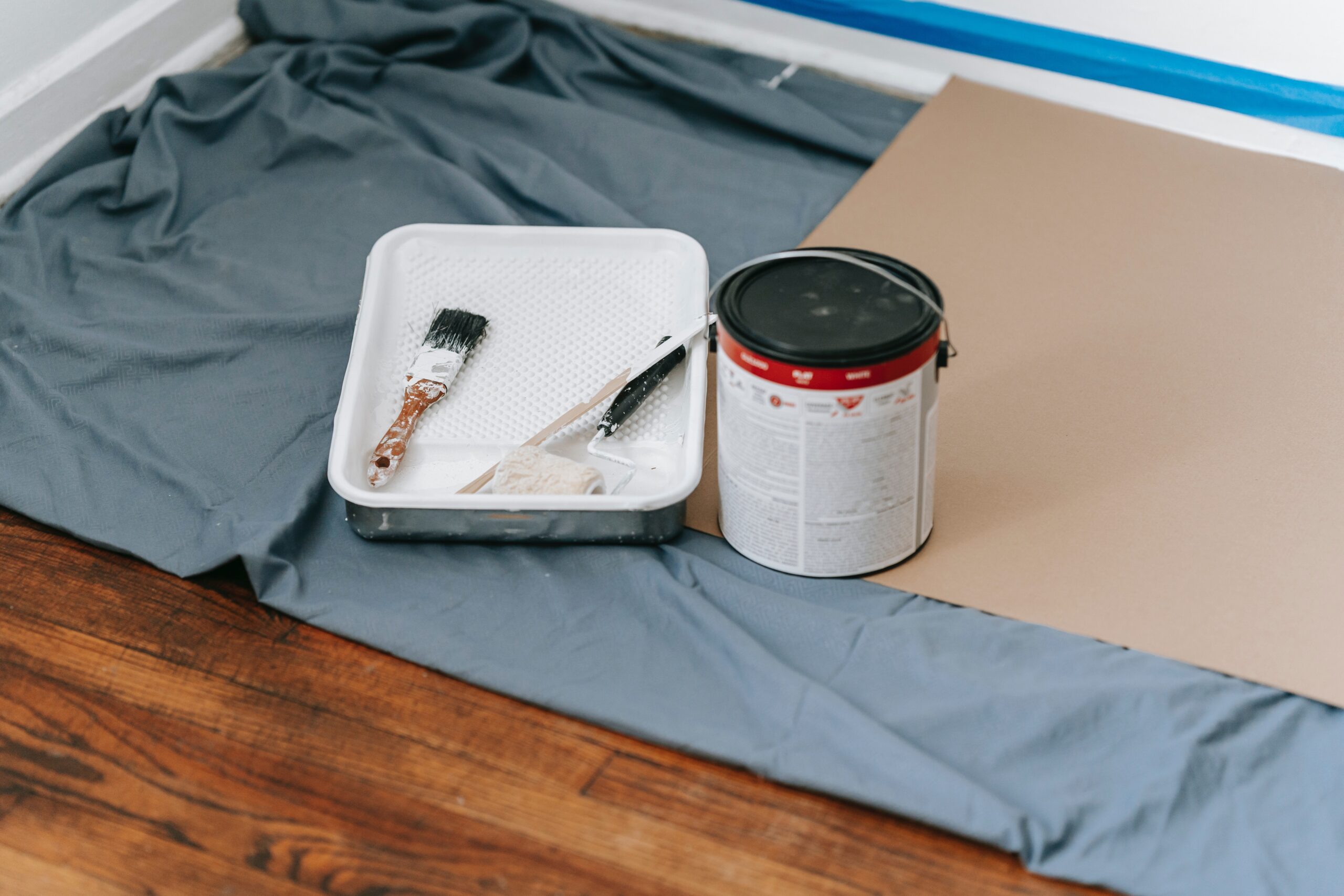 Paint supplies on the floor