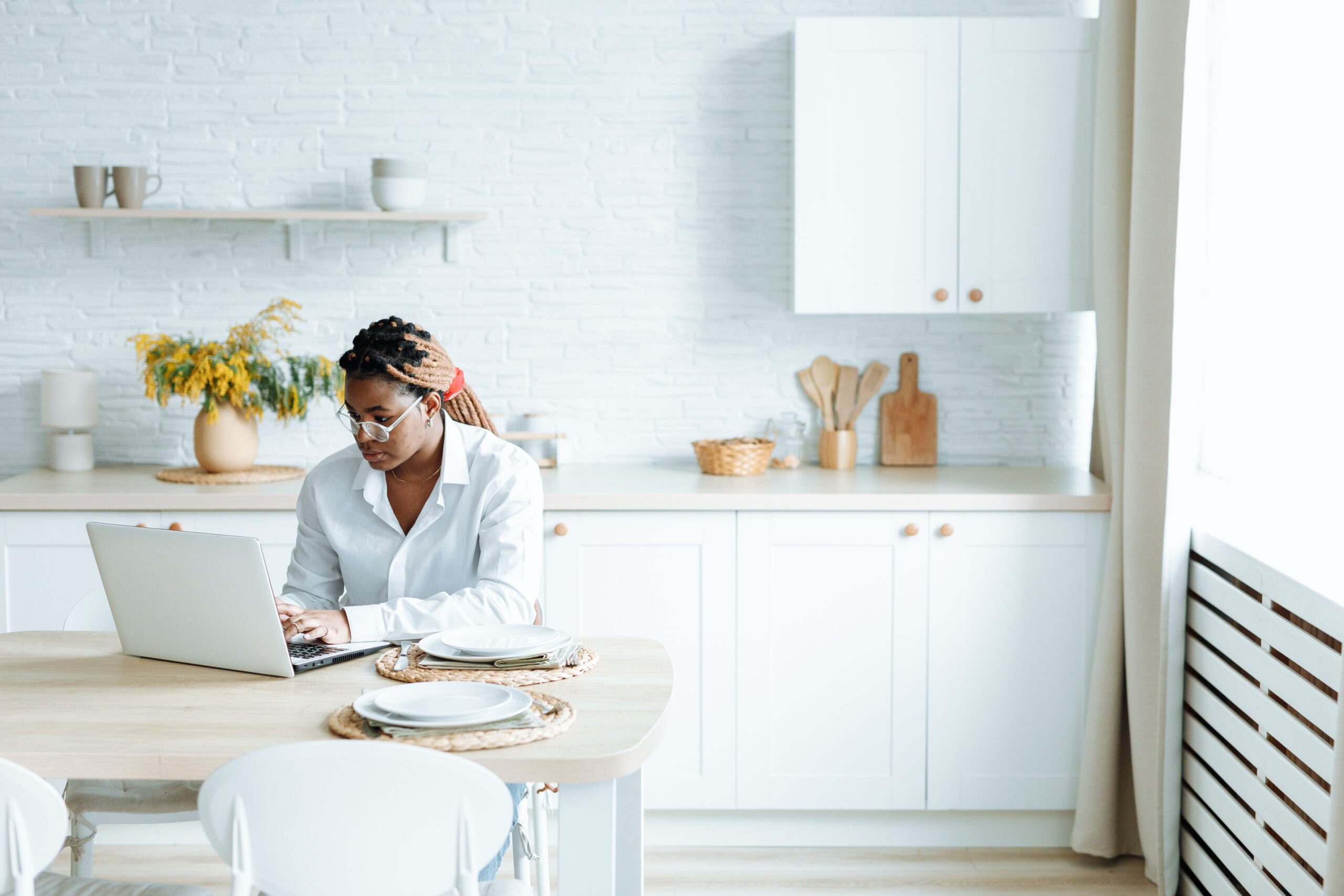 woman doing research in kitchen