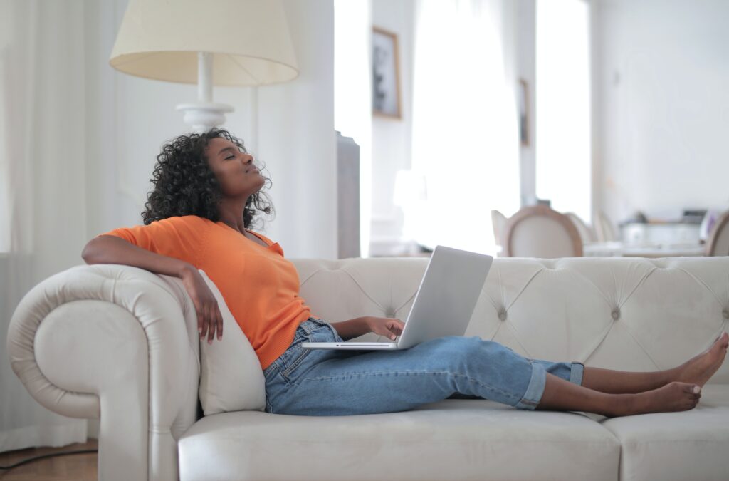 A woman relaxing on the couch