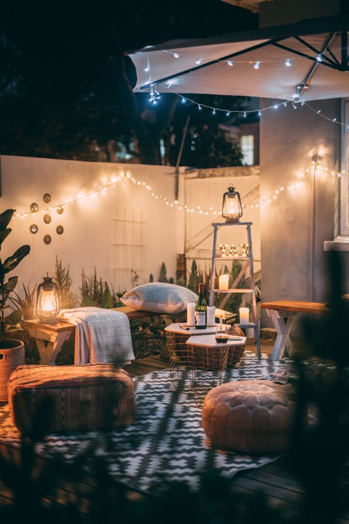 Cozy seating in backyard with string lights