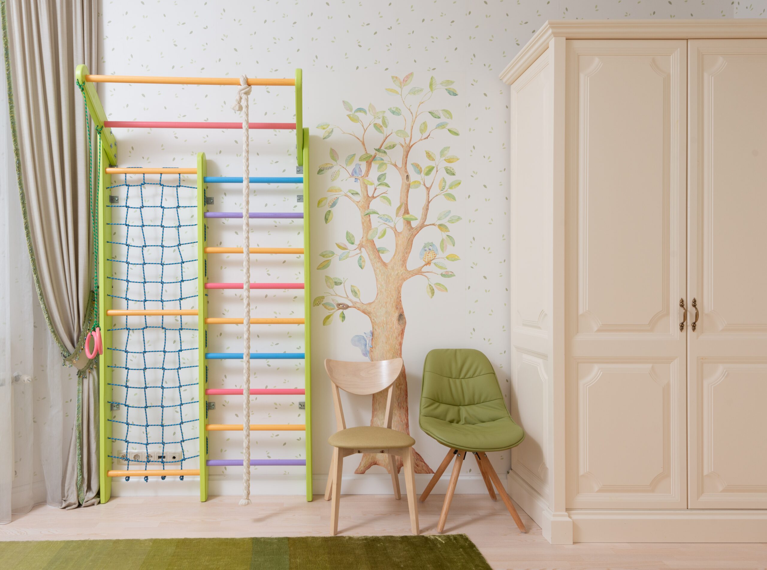 A playroom with stenciled walls