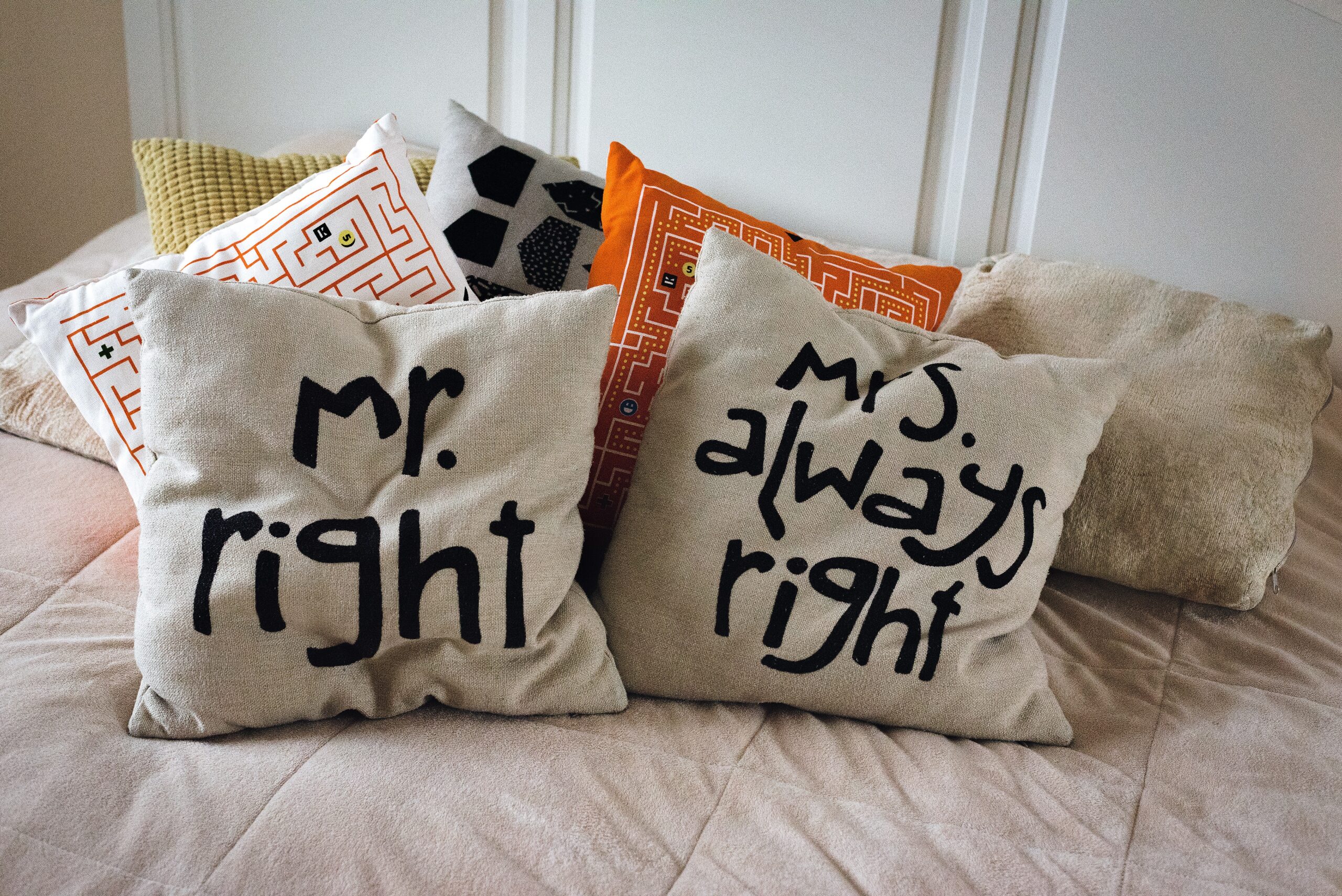 Throw pillows with wording on them