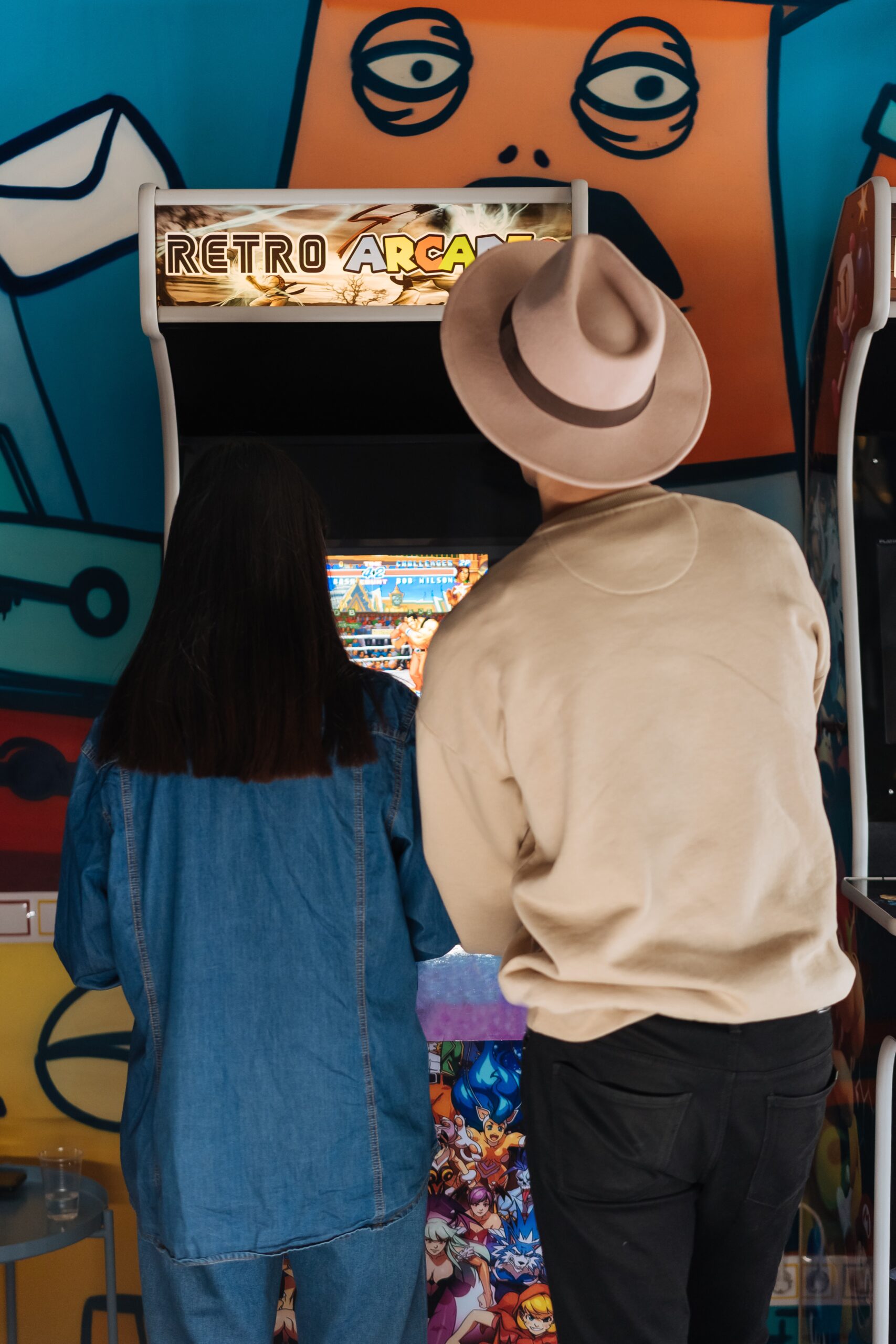 Couple playing retro game
