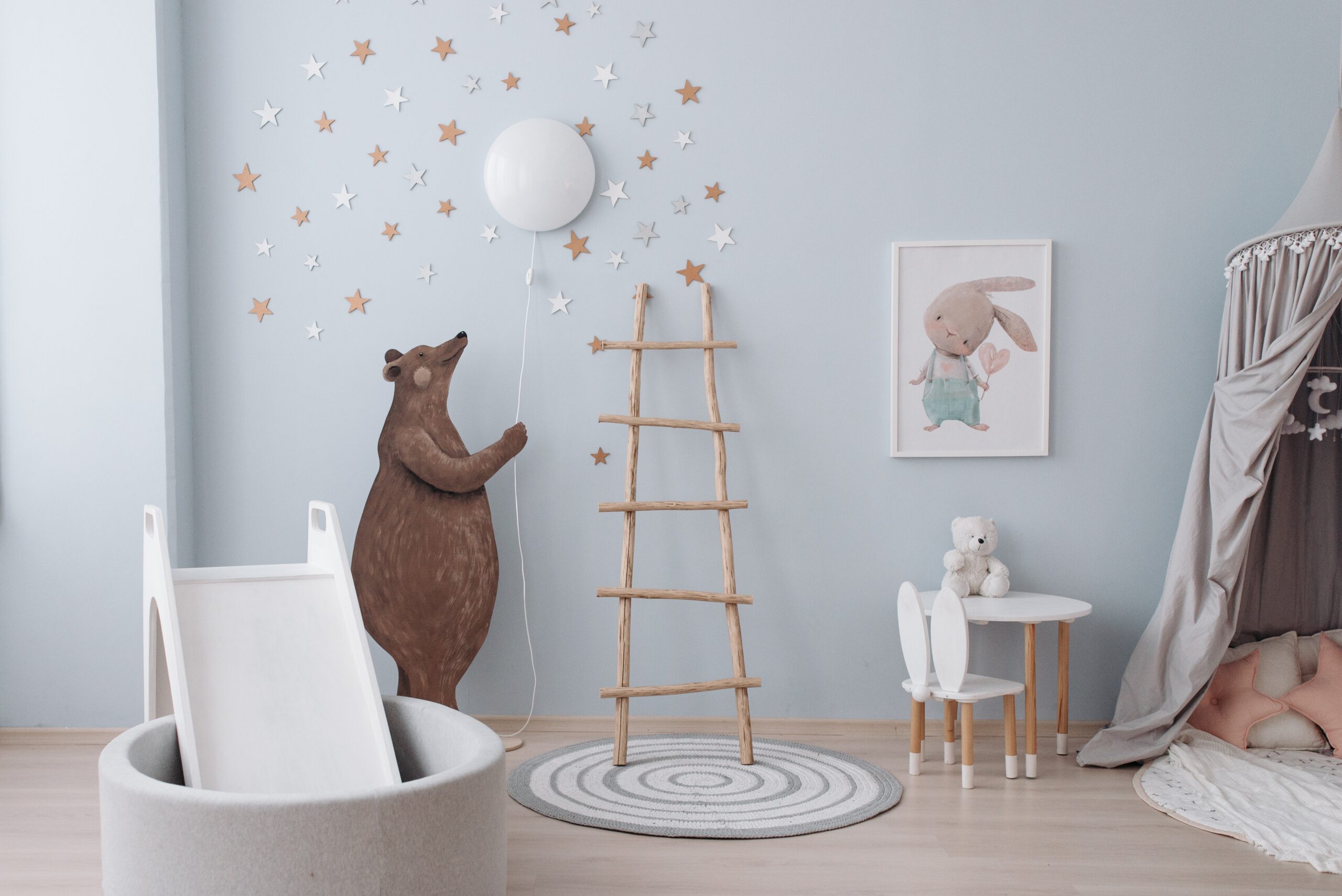 Baby room with bear wall art