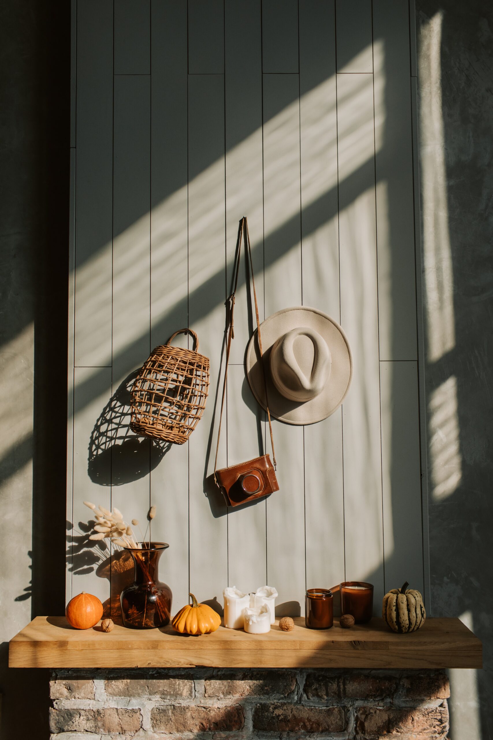 Fall decor with Earthy tones, hats and handbags