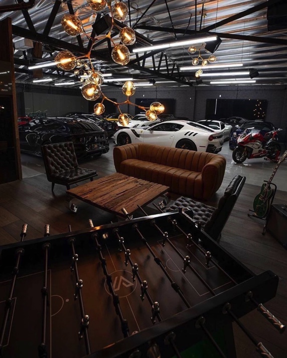 A lounge area in a luxury garage