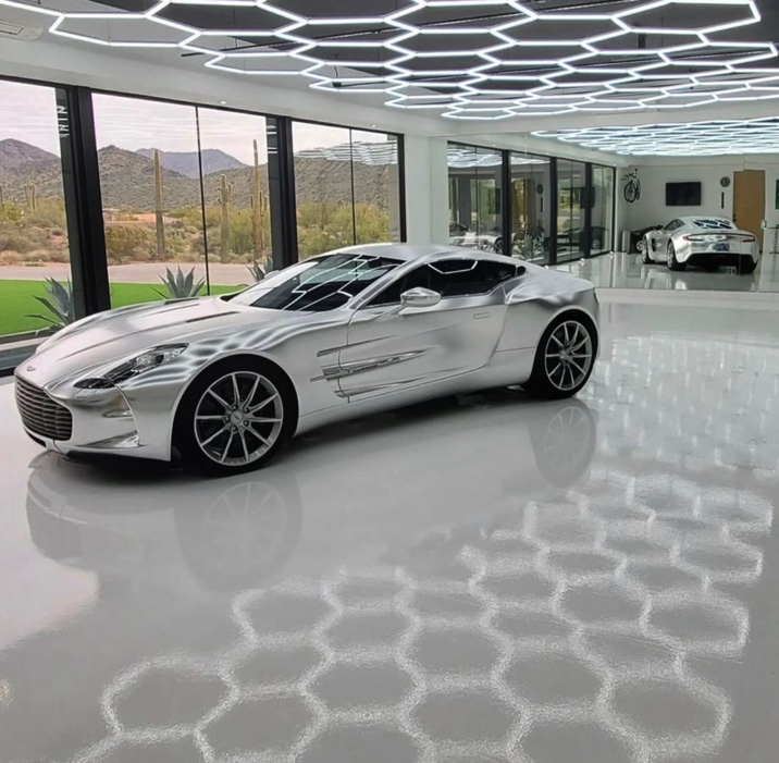 A luxury car in a luxiry garage