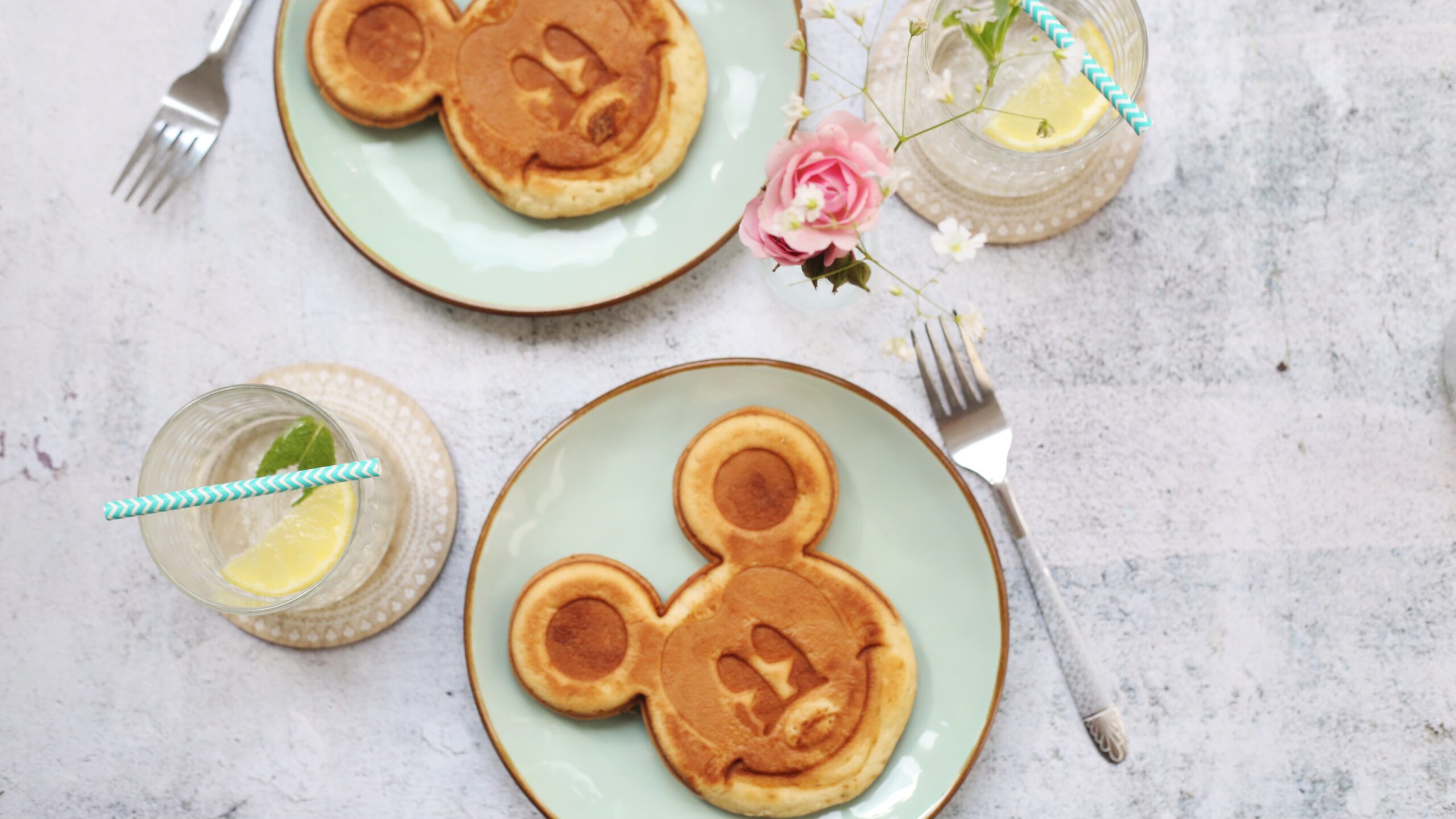 Pop culture, movie, character, music, and TV show themes are fun potluck themes for your guests. Pictured: Mickey waffles.