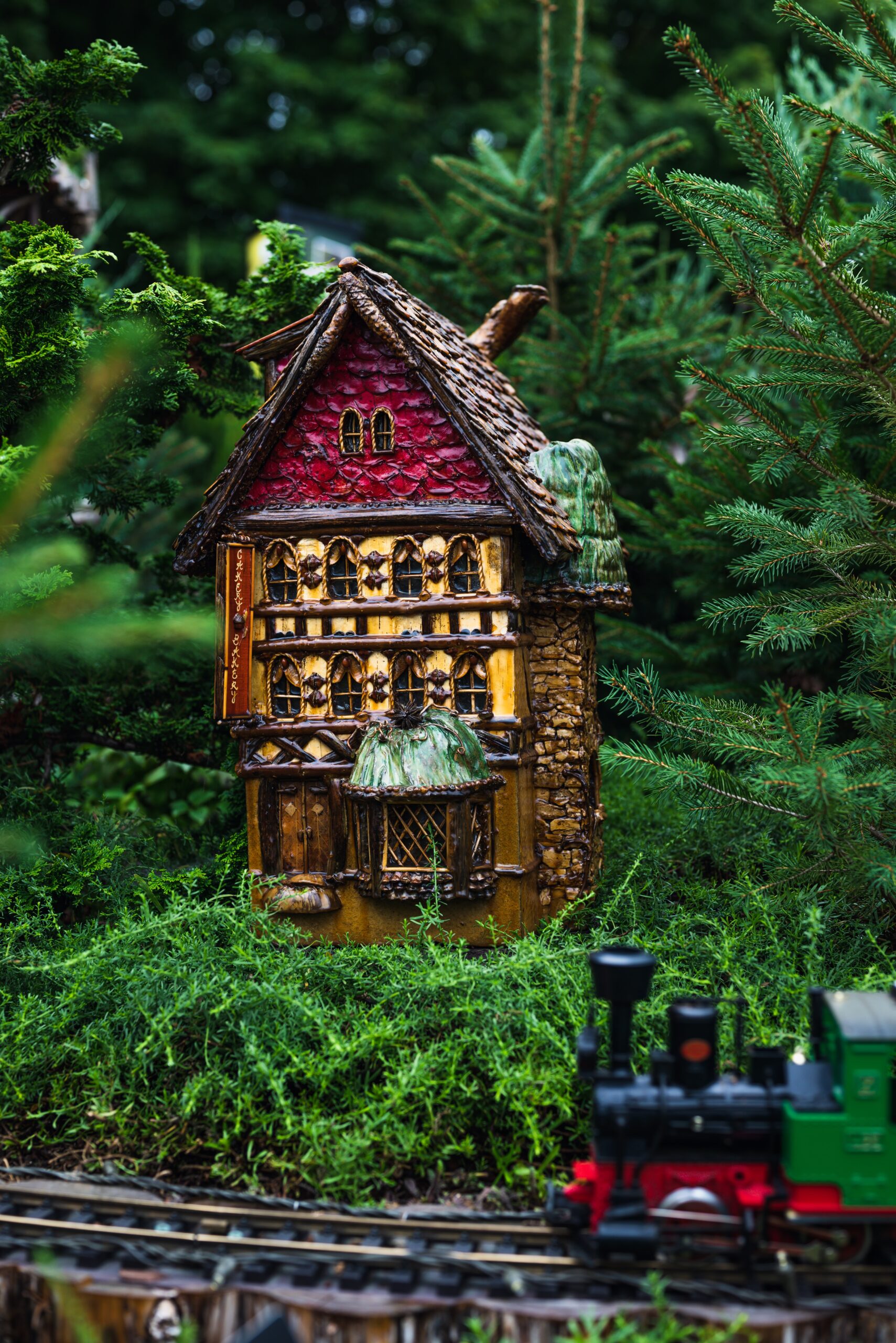 Fairy home with train in backyard