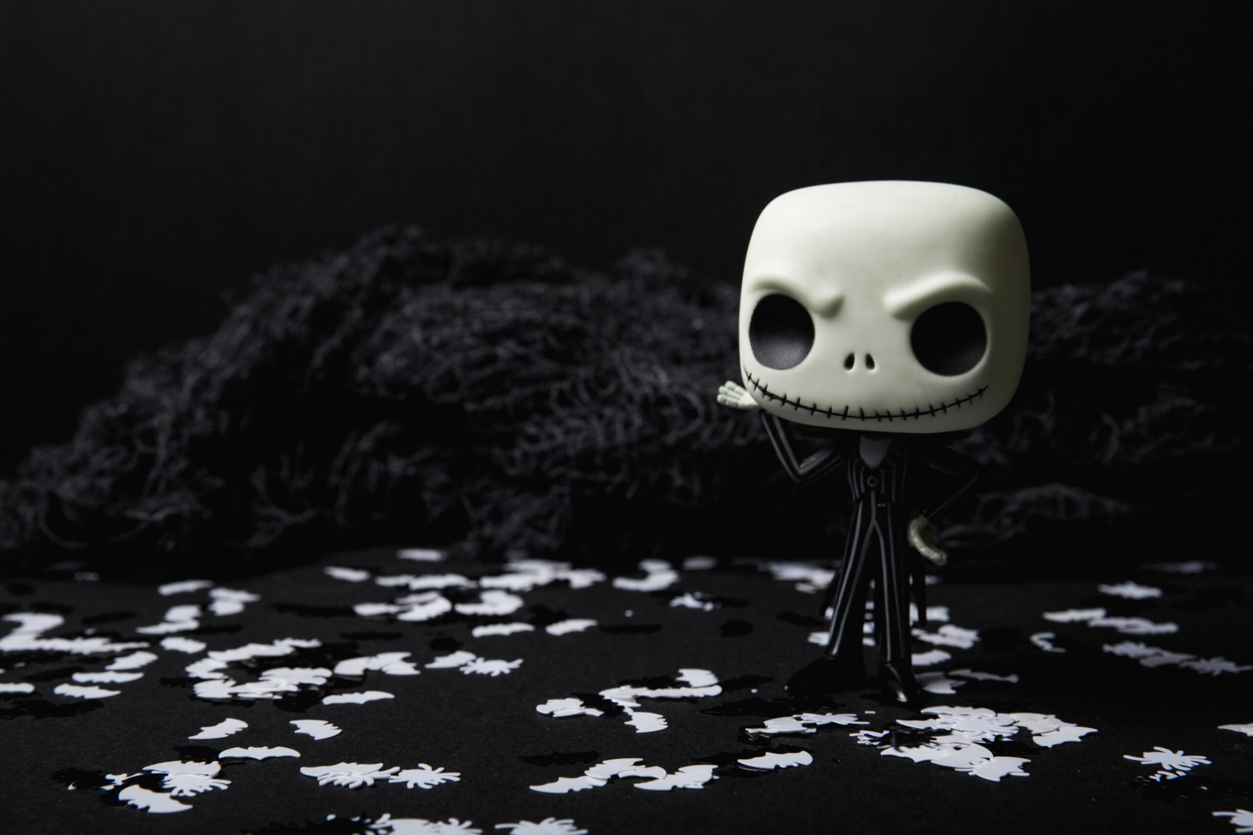 Add your Halloween toy collection to your display shelves for a playful Halloween aesthetic. Pictured: Jack Skellington Pop figure from The Nightmare Before Christmas.