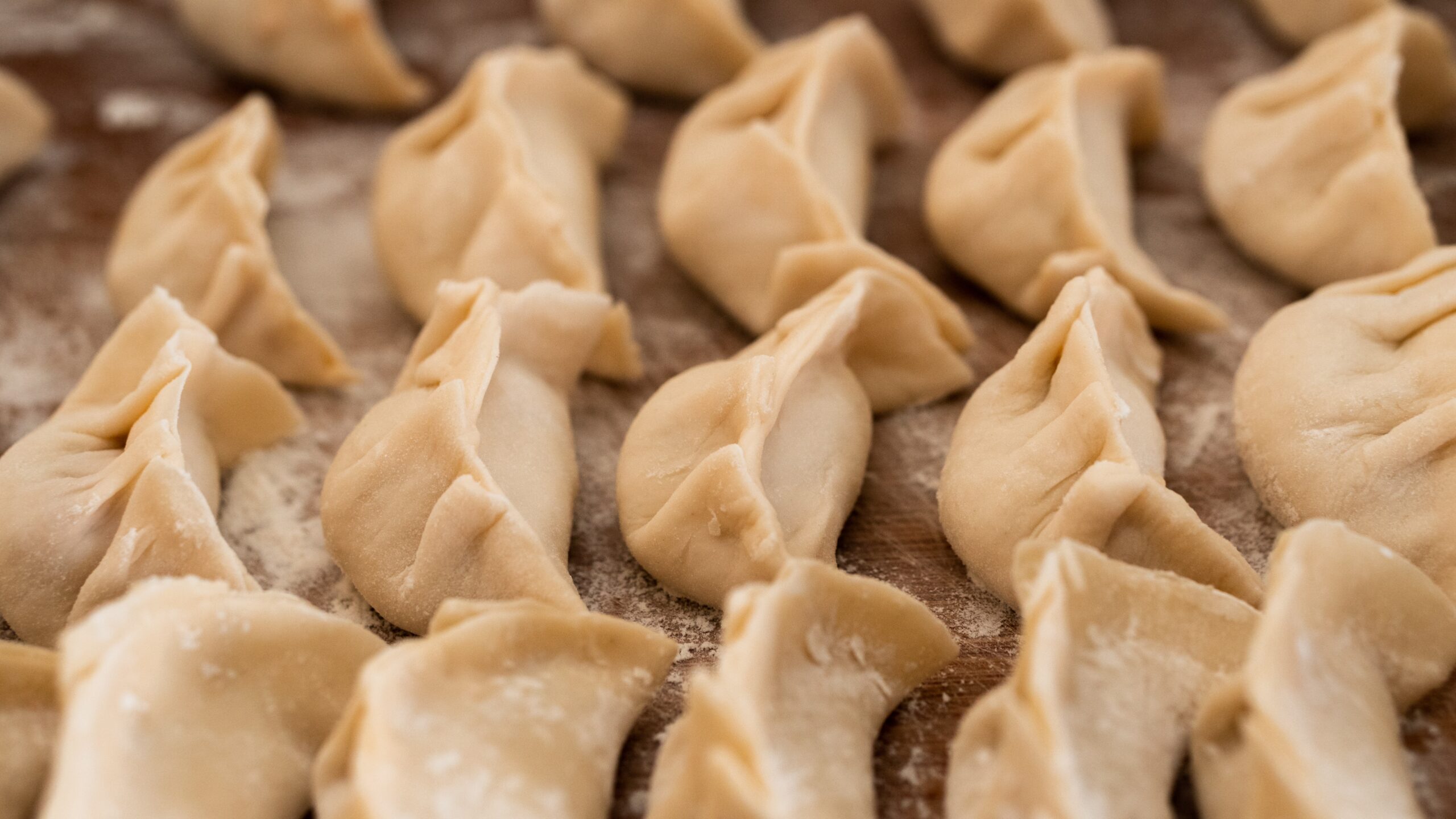 Culture-inspired dishes and TikTok trends are perfect ways to utilize a potluck theme. Pictured: Dumplings.