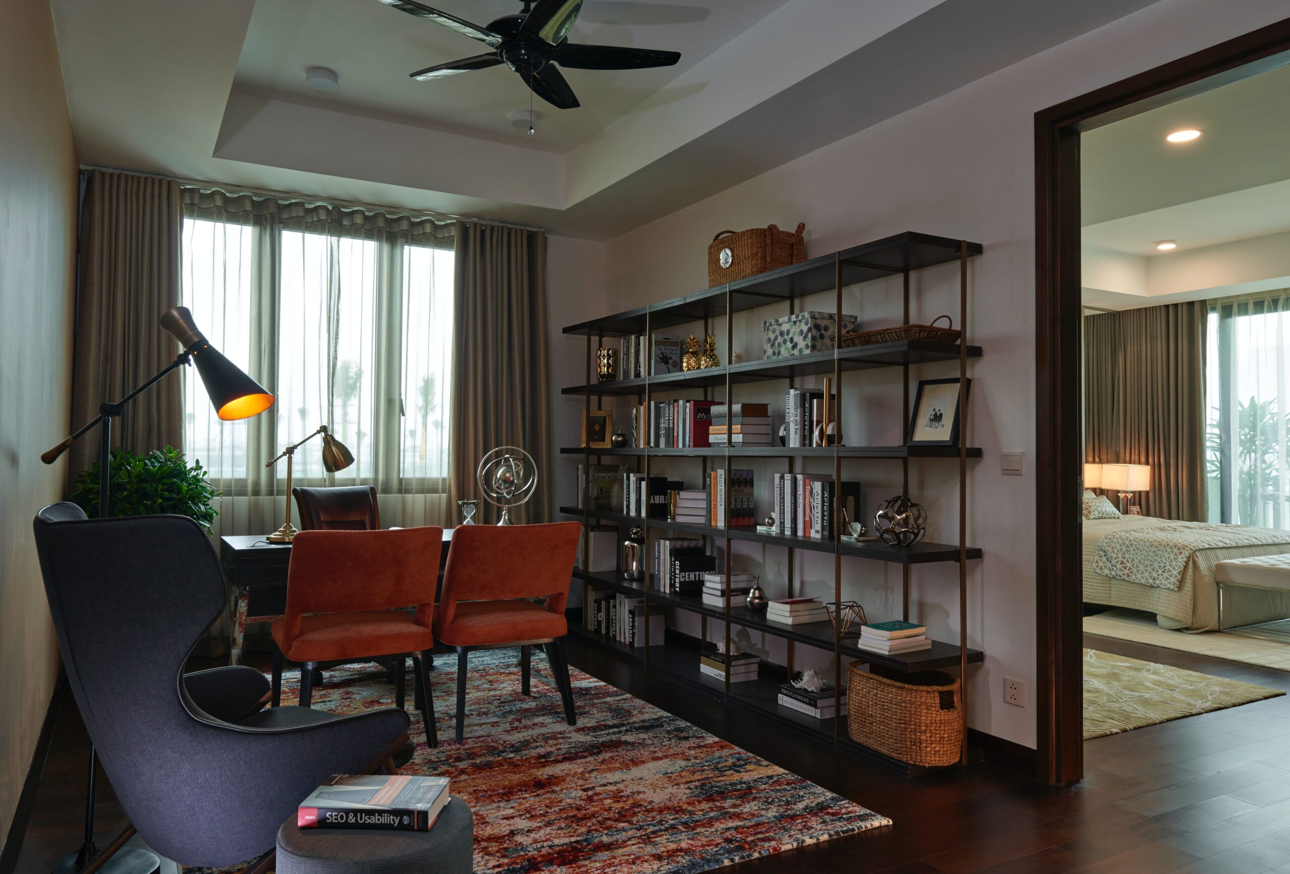 Utilize built-in shelving for storage, displaying art work and decor and as your home office background. Pictured: A home office