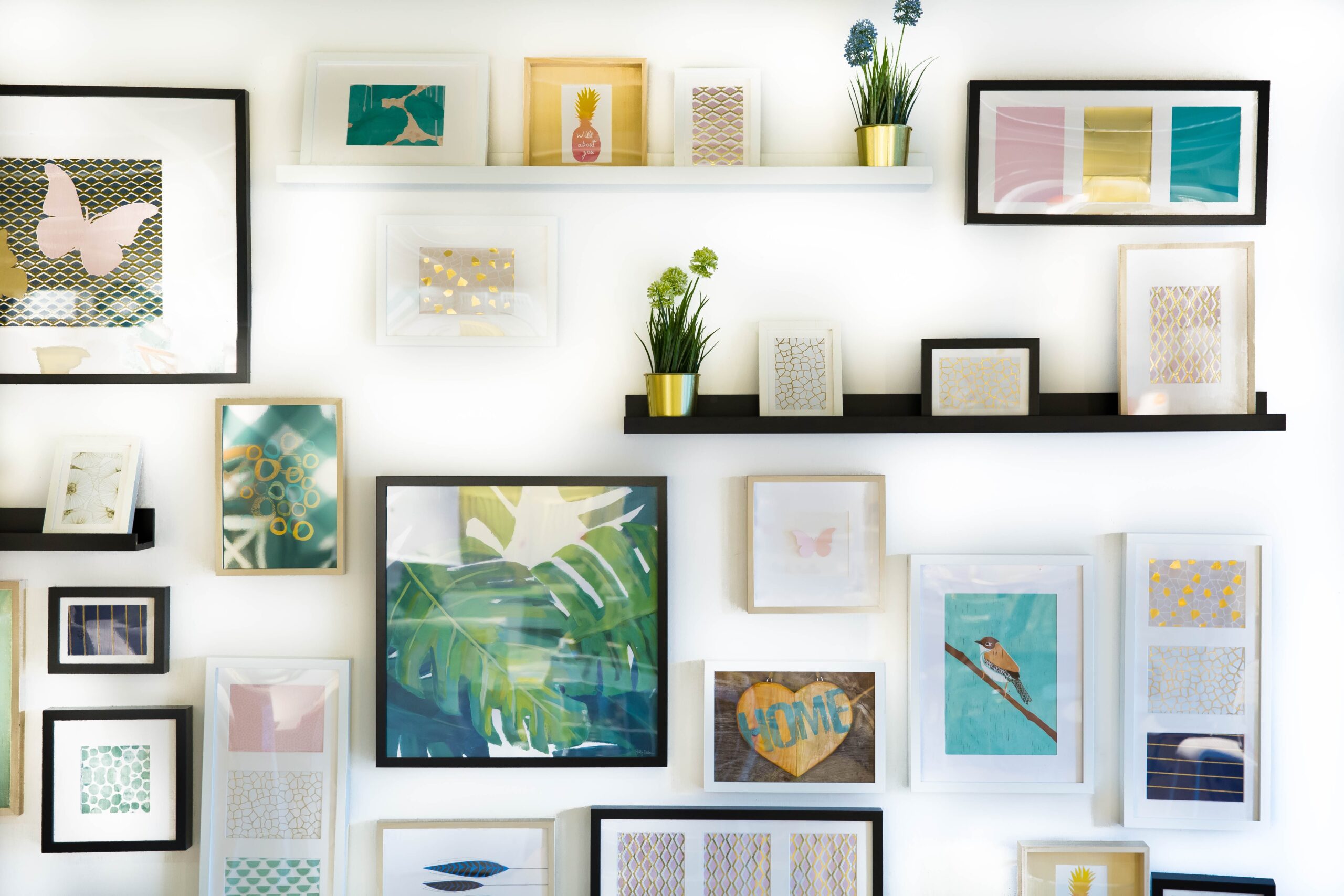 Create a gallery wall as your home office background. Pictured: A gallery wall.