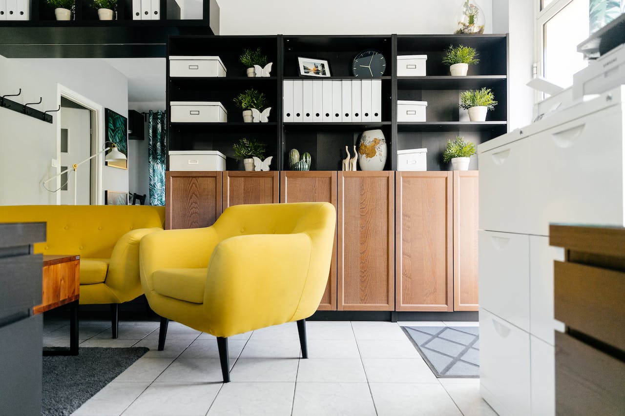 Living room with a mustard couch and chair