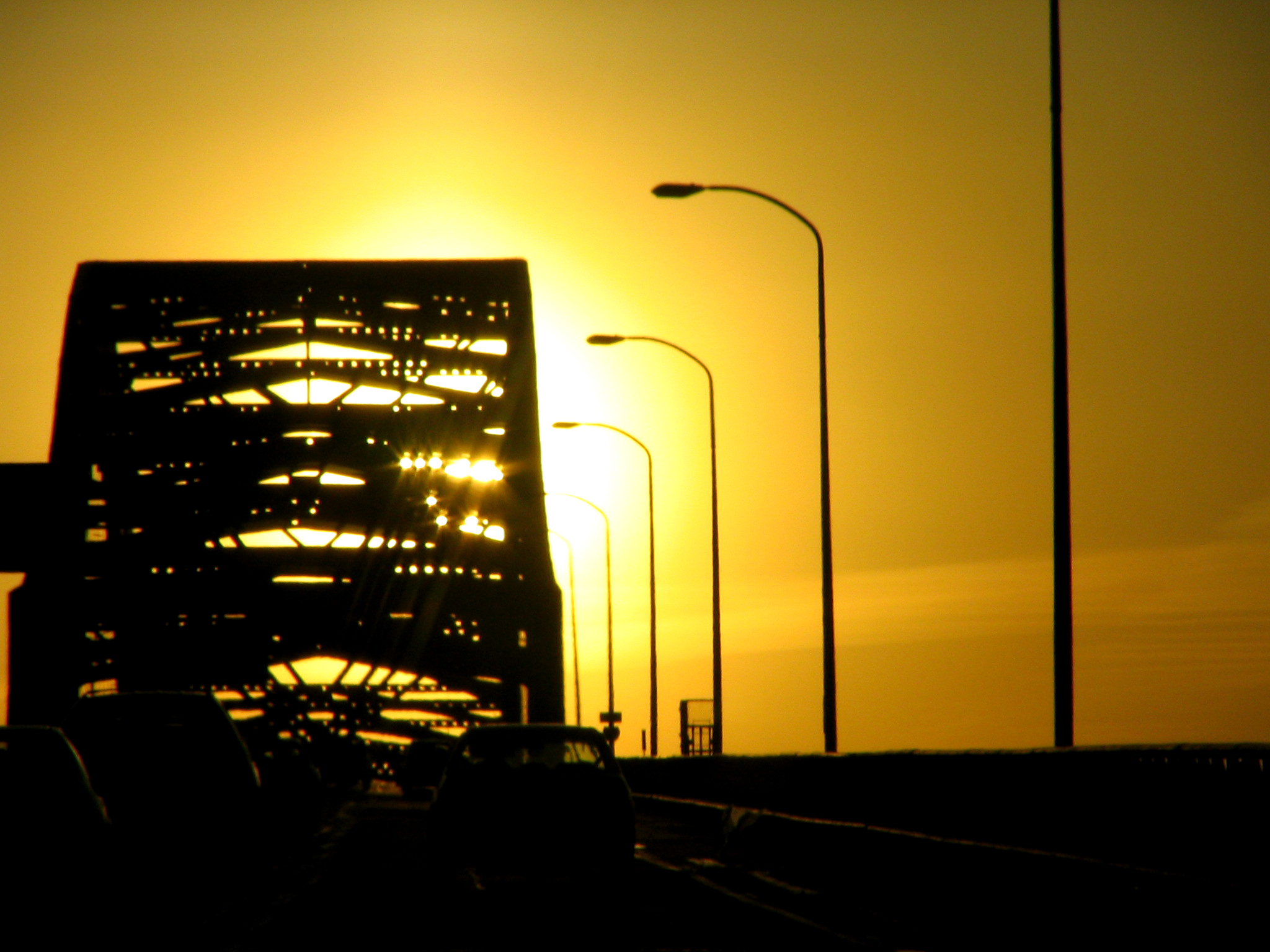 The Sun sets behind the Newark Bridge