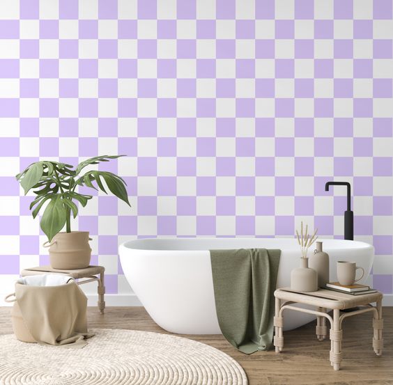 Use a square pattern in purple and orange shades to create a checkered affect. Pictured: A lavender checkered wall