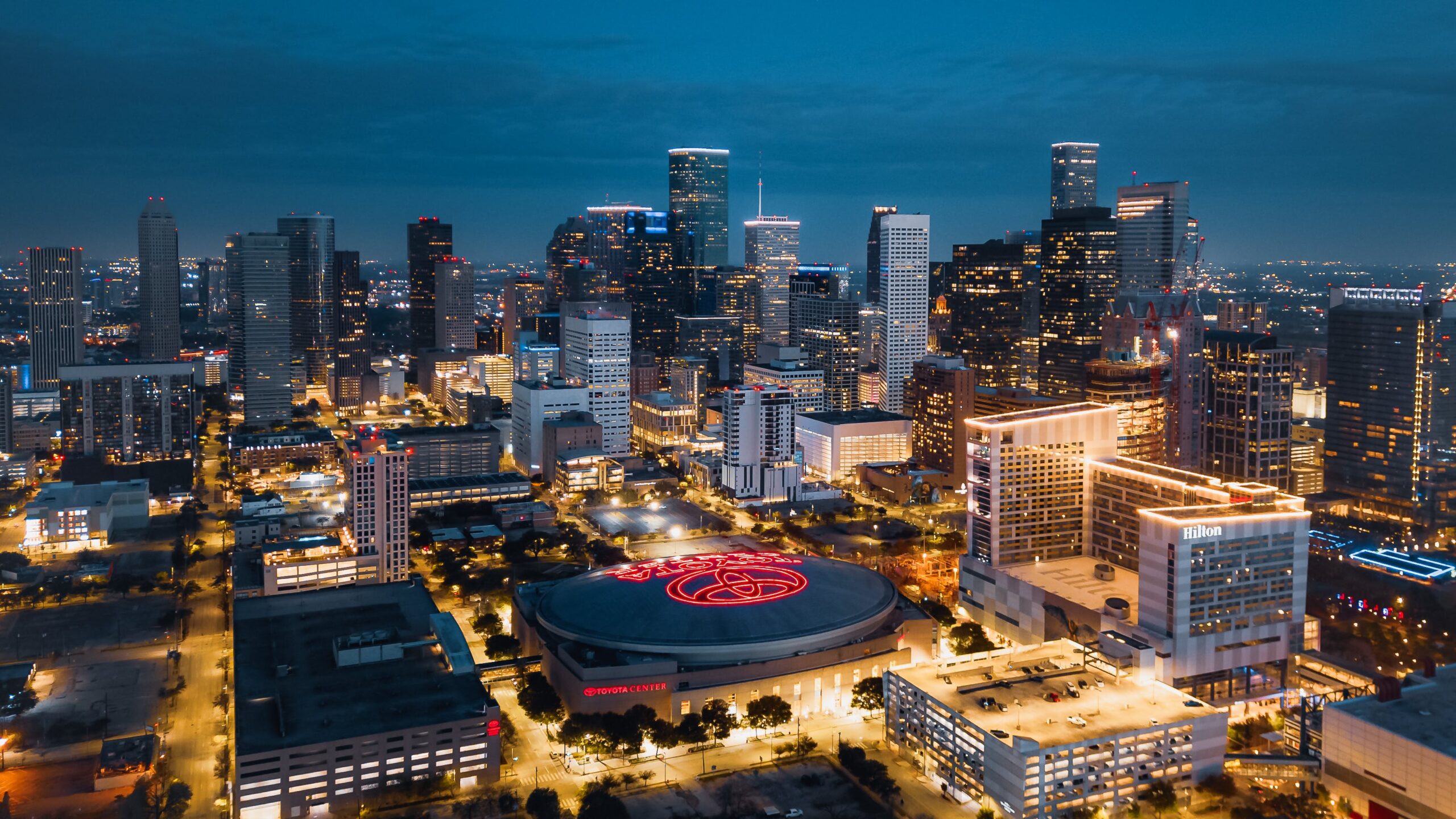 Downtown is the heart and center of Houston and one of the best places to live in the city. Because of its amenities, young professionals and families love living here. Pictured: An aerial view of Downtown Houston