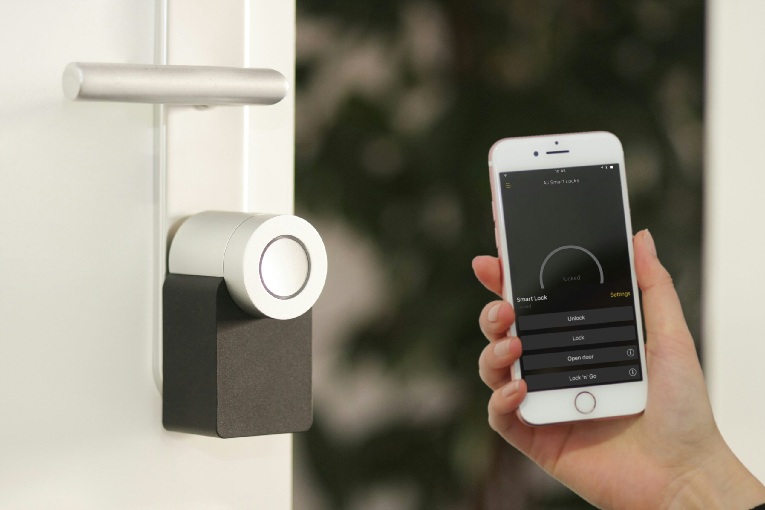 A person setting up a smart lock for the home
