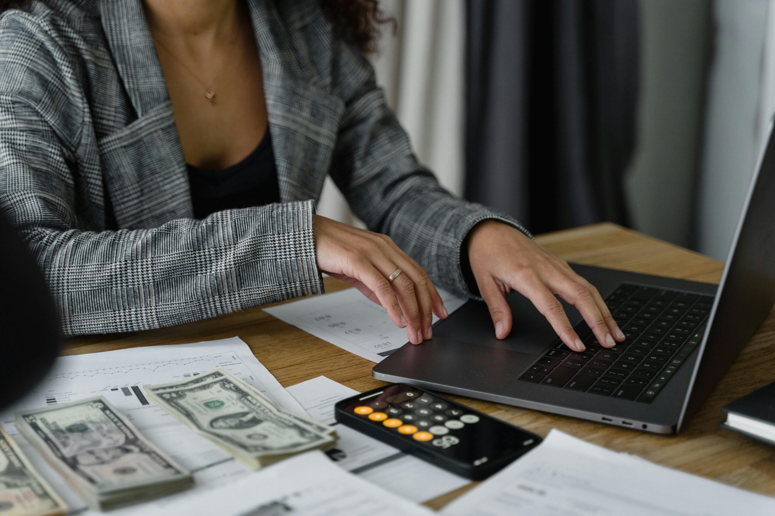 A woman budgeting at a desk