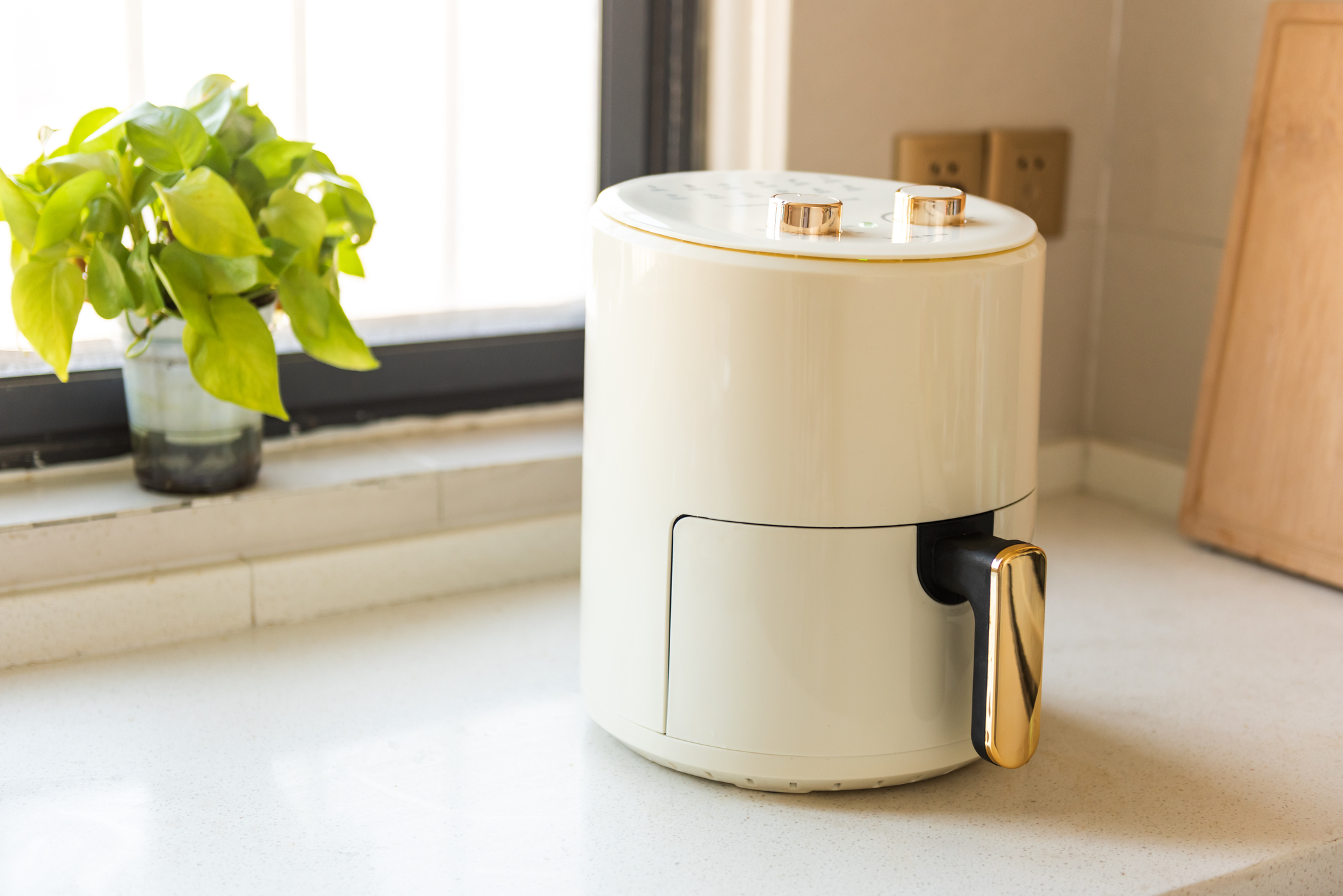 Here's your step-by-step guide to cleaning grease, gunk and stains from an air fryer. Pictured: An air fryer on a kitchen counter