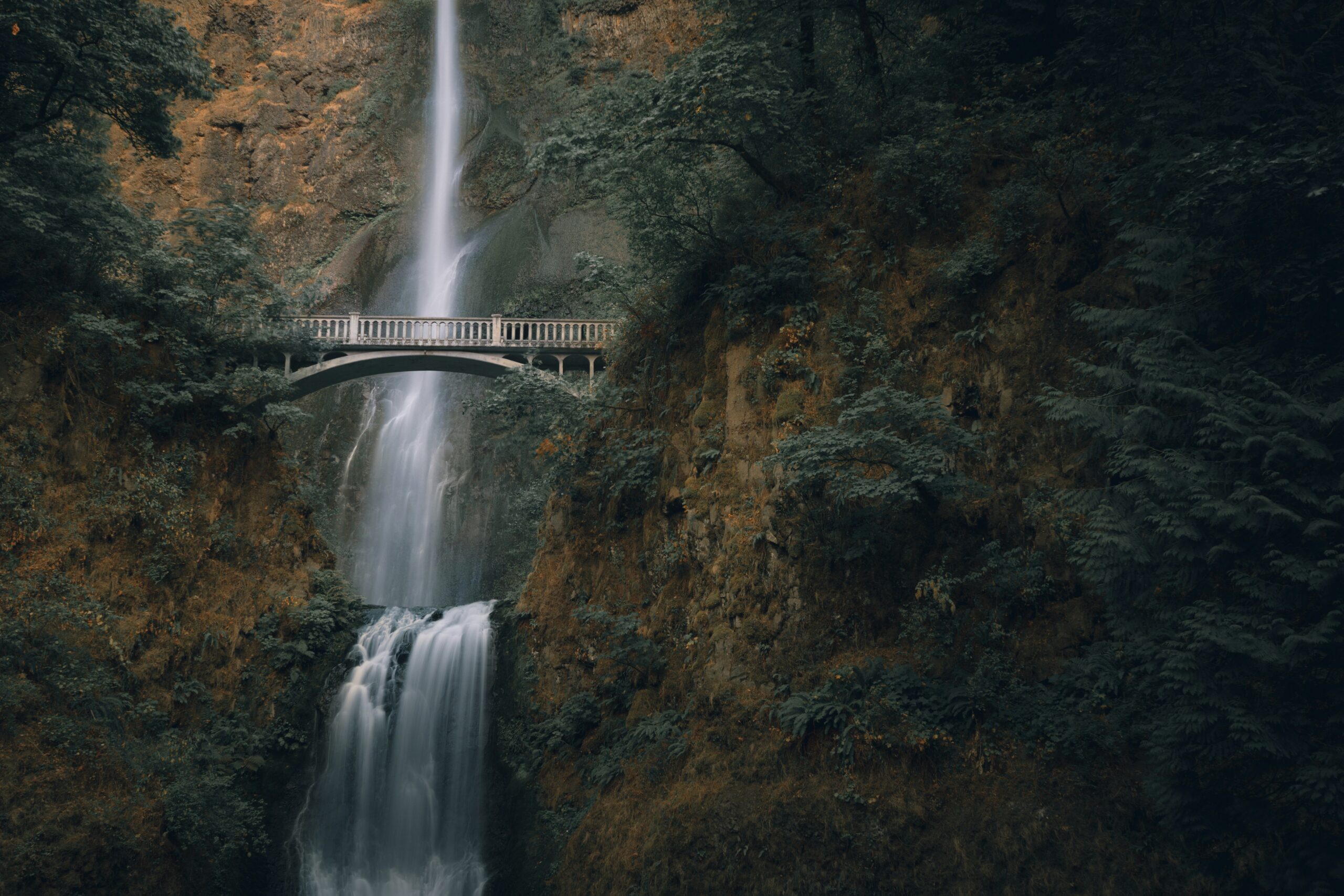 Gresham is one of the best places to live in Oregon for a lower cost of living outside of Portland. Pictured: A waterfall in Oregon