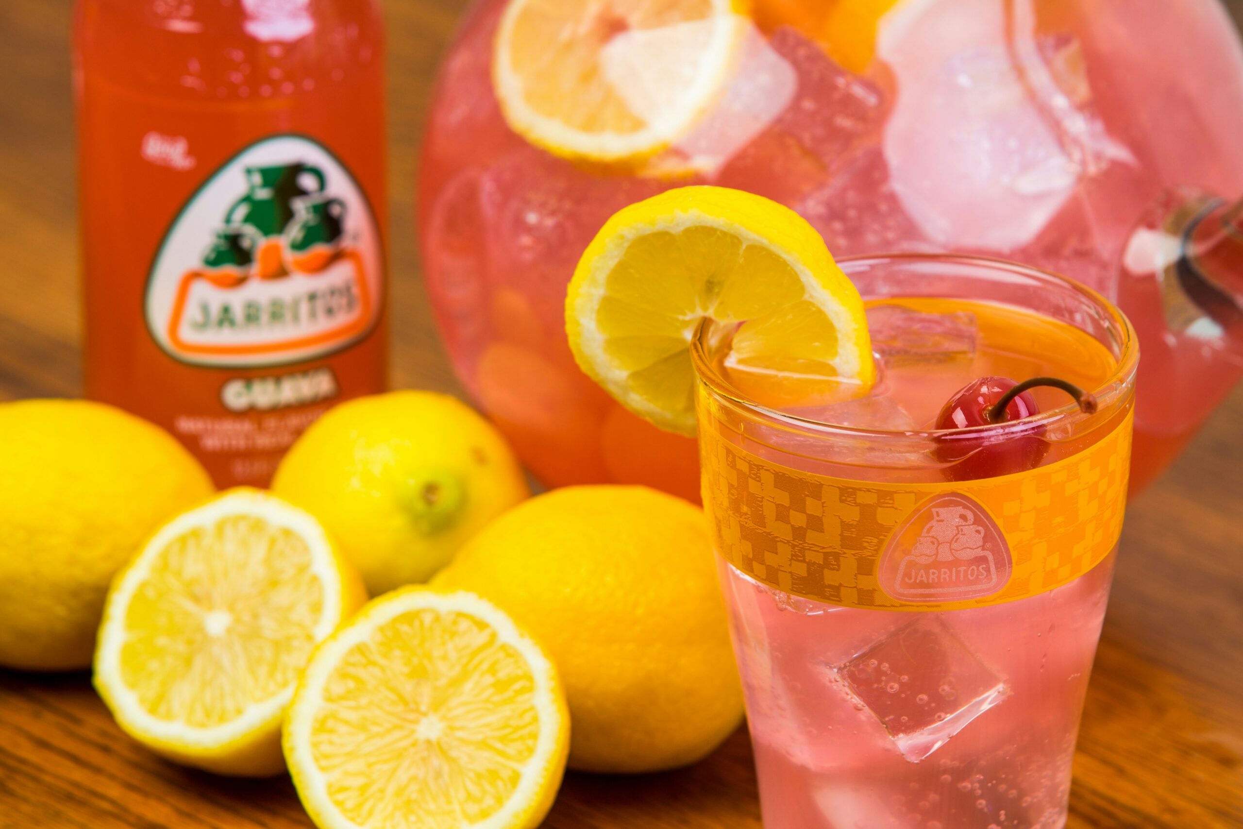 Combine your ingredients to make this Cupid's Kiss love mocktail. Pictured: A pink lemonade drink