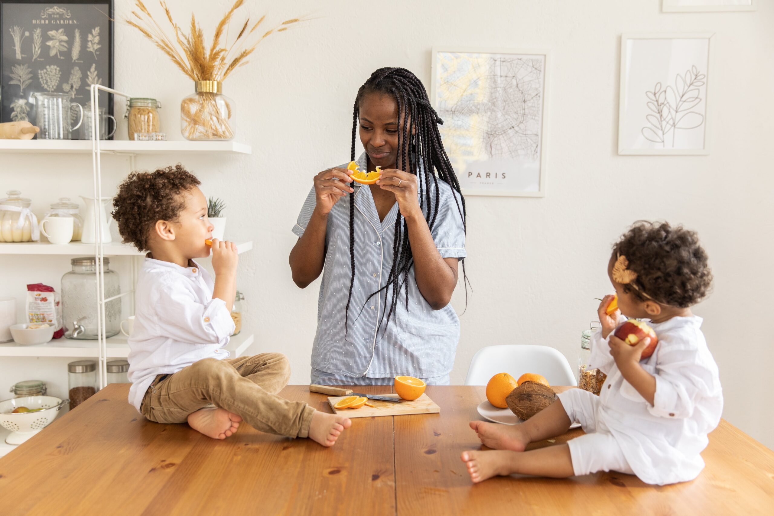 woman and children eating healthy