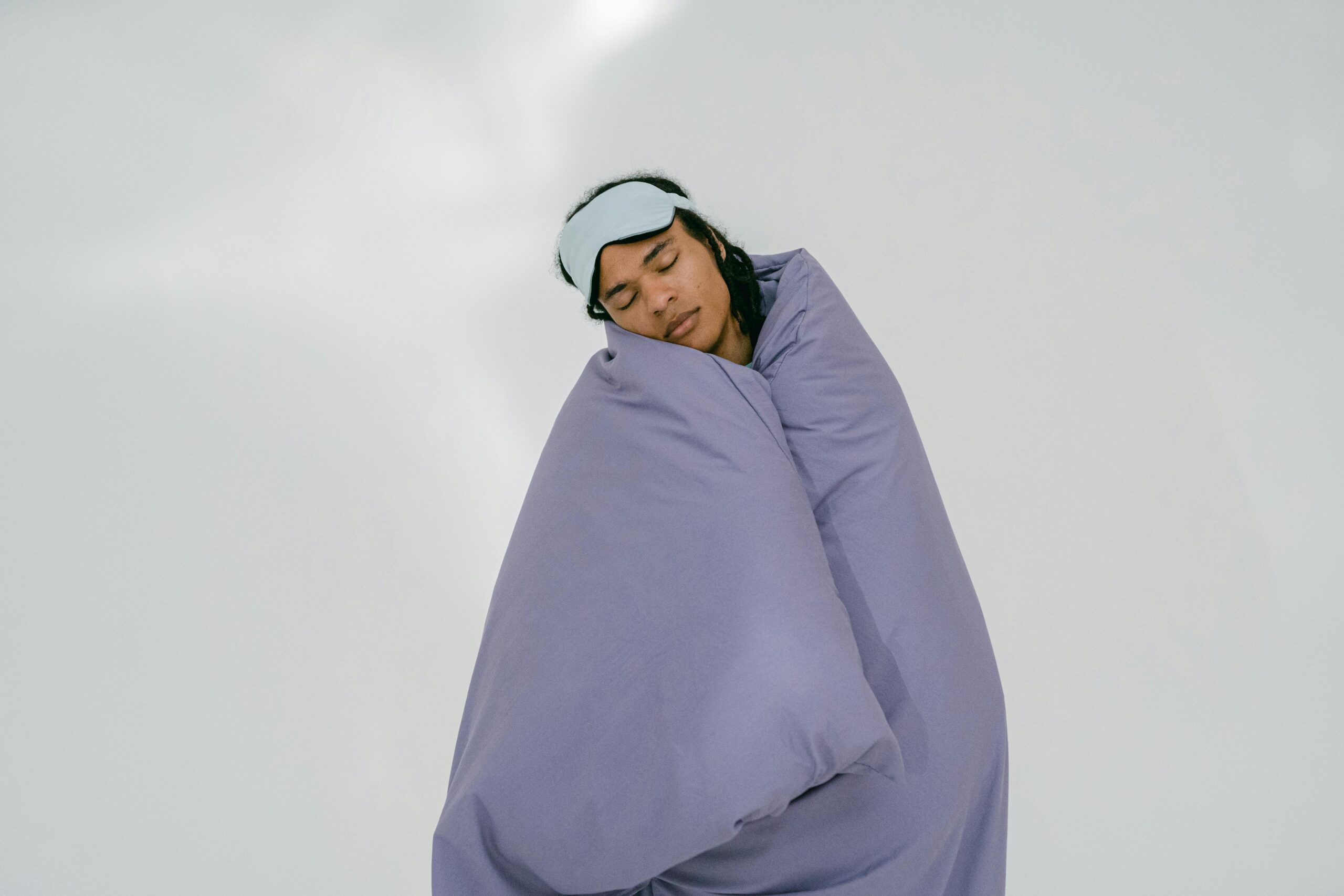 person holding a weighted blanket
