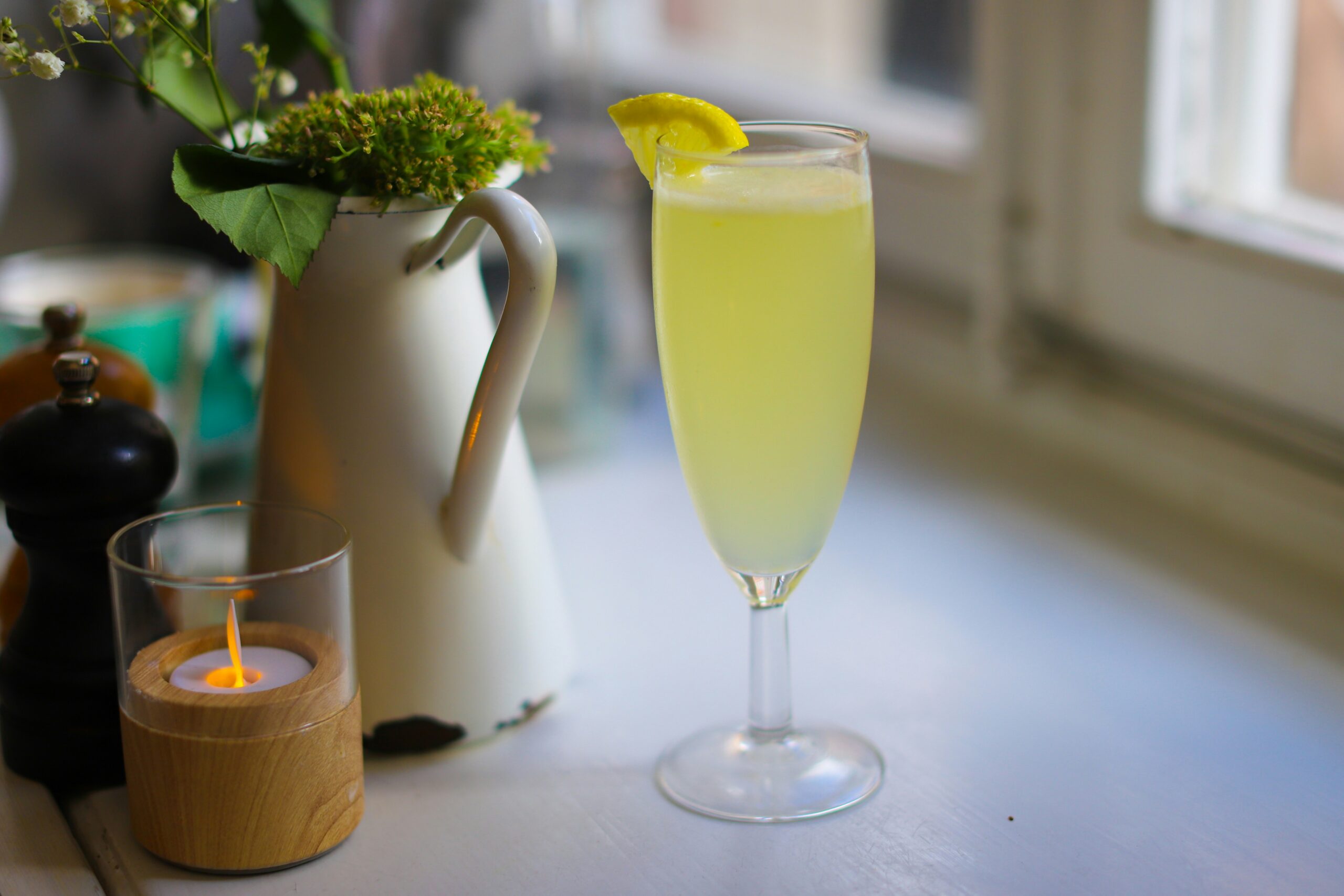 With just a few ingredients, this guide shows you how to make a french 75 cocktail. Pictured: A champagne cocktail