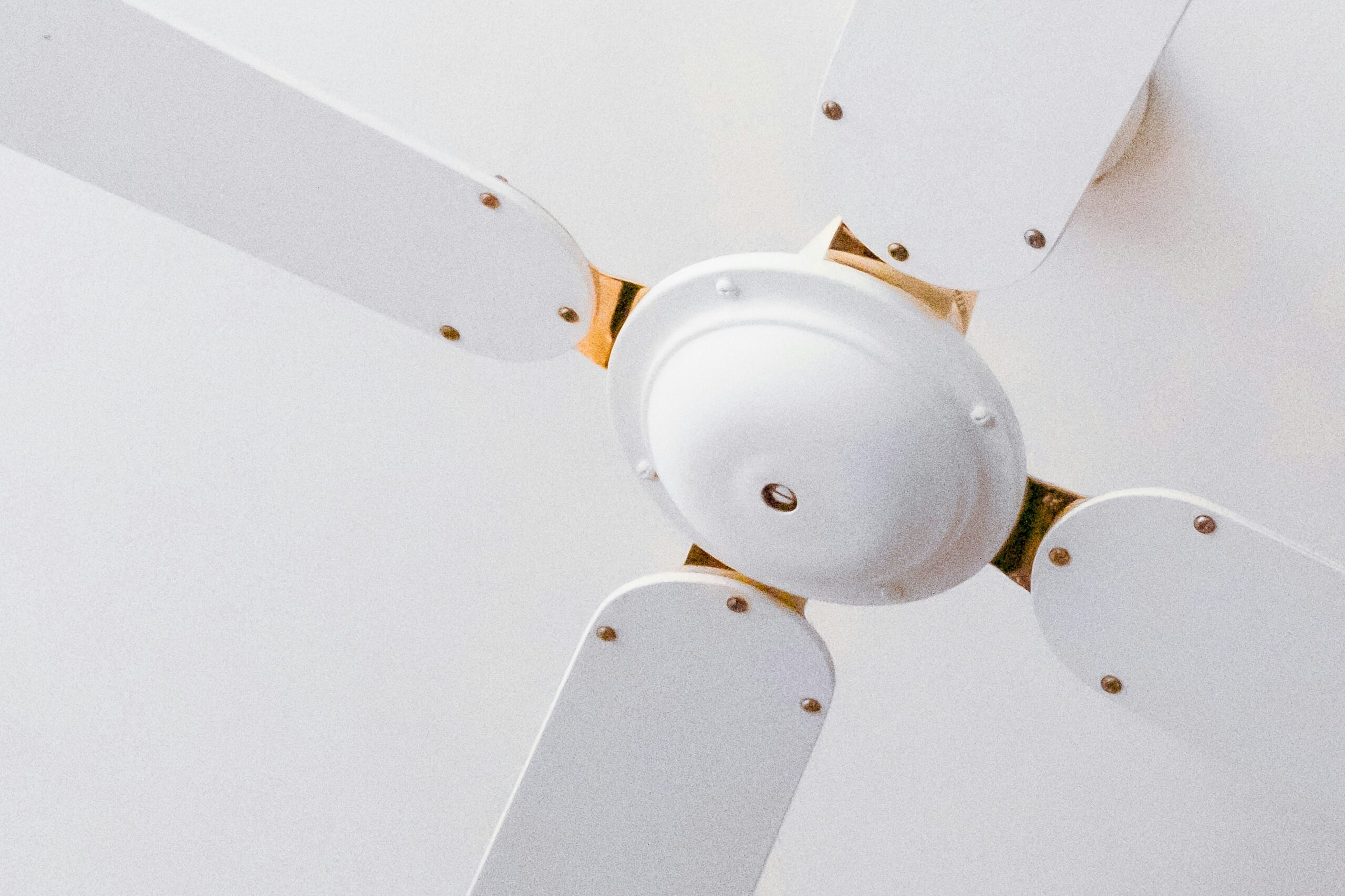 A close up shot of a ceiling fan