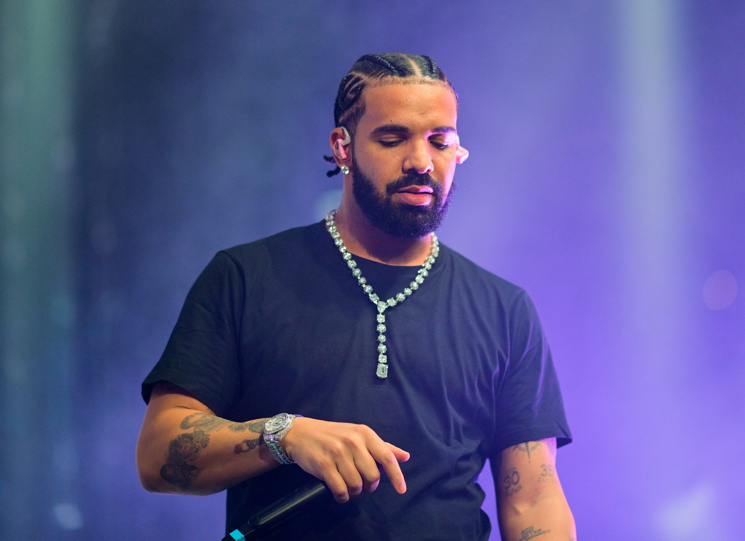 Where does Drake live? He has multiple properties in and outside of the U.S. Pictured: Drake performing at a concert