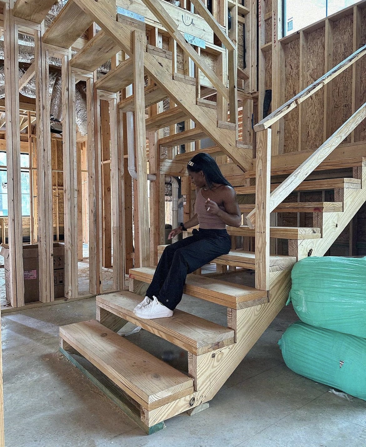 Where does Simone Biles live? Her and her husband are currently finishing up building a mansion in Houston, Texas. Pictured: The unfinished stairs in the couple's home. 