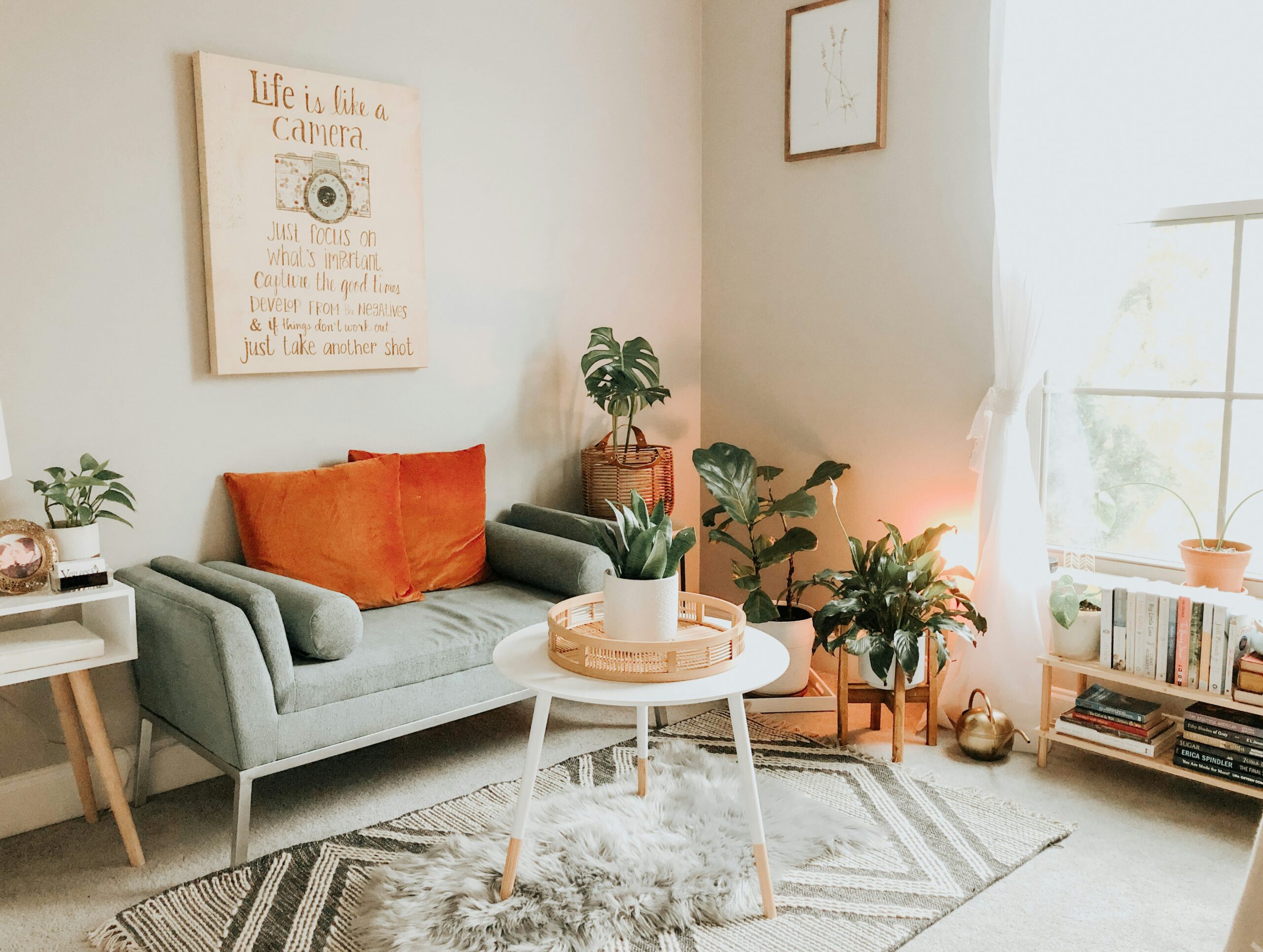 Add home decor pieces to create a Hygge aesthetic. Pictured: A cozy living room with color
