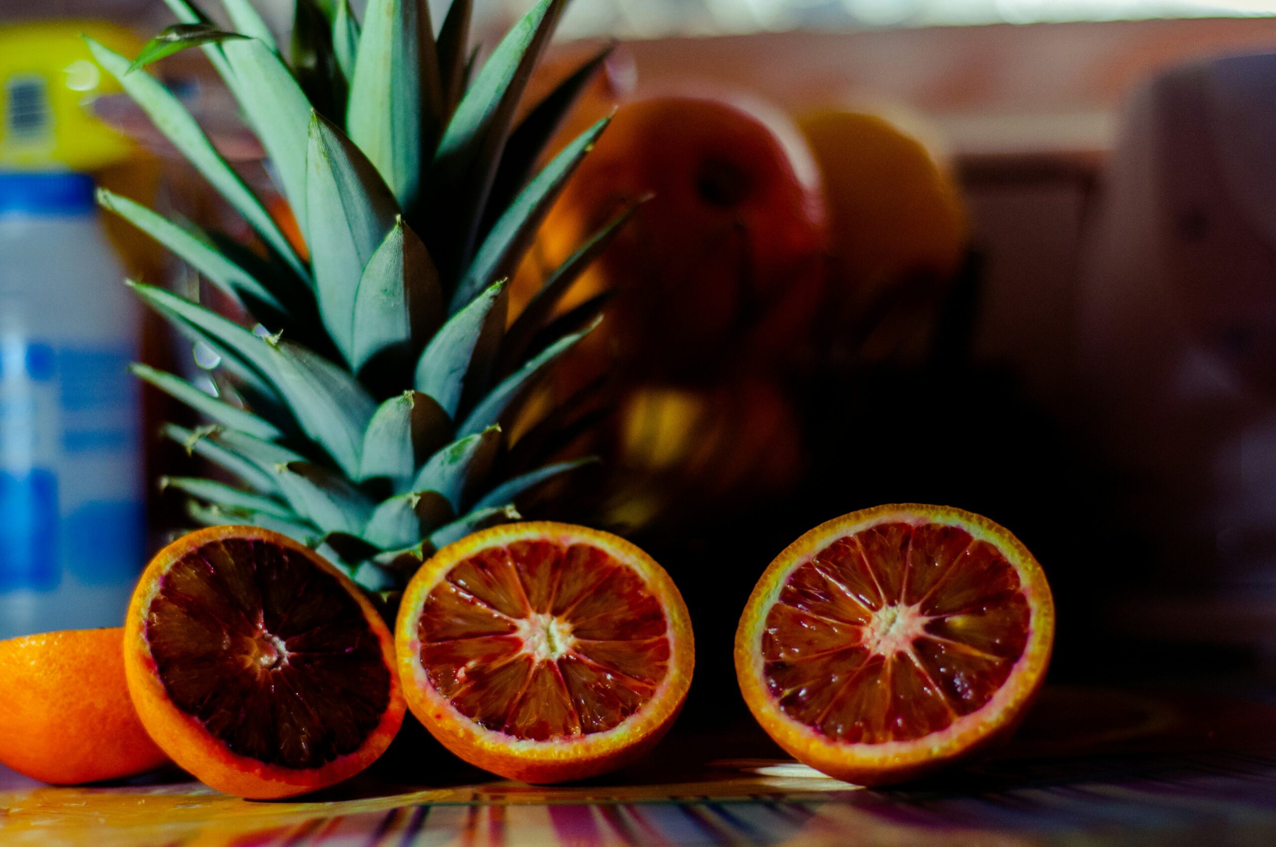 For a touch of citrus, add some pineapple juice in your adrenal cocktail. Pictured: Pineapple and oranges