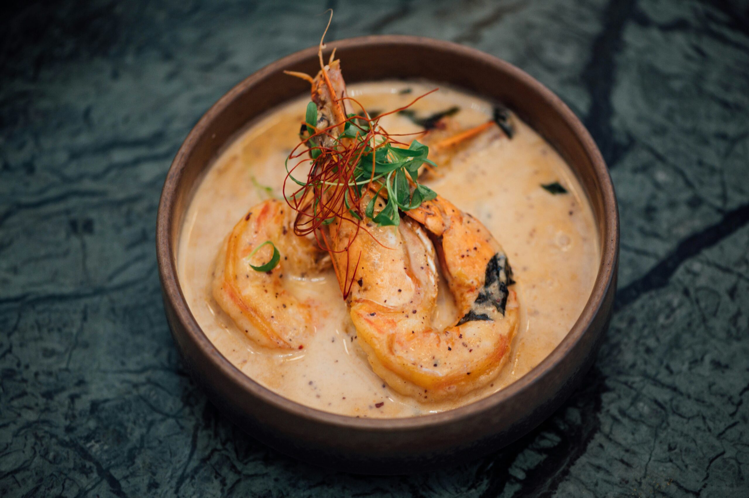 Shrimp and grits is a classic southern meal and an easy Sunday dinner idea. Pictured: Shrimp and grits