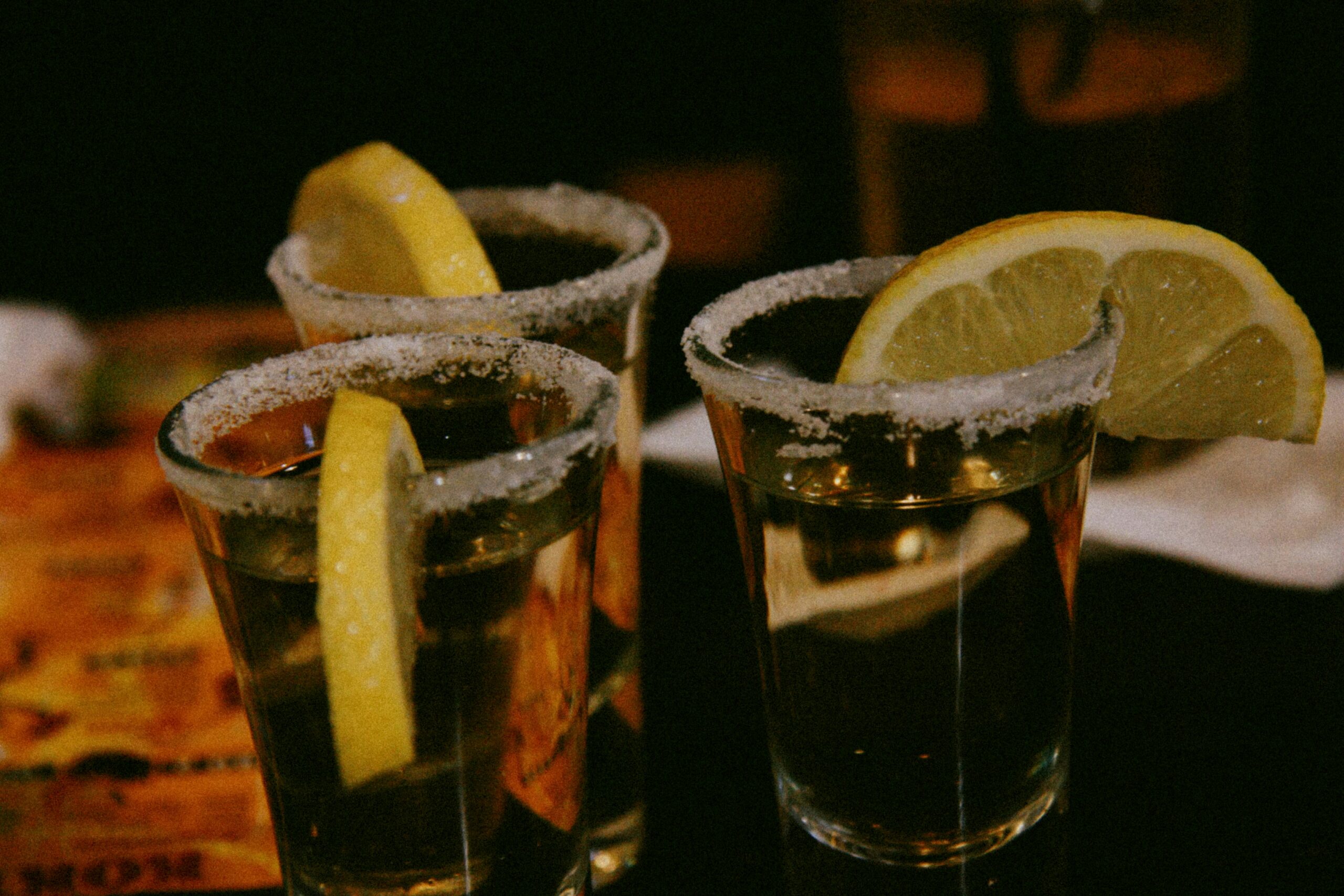 What pairs well with tequila? Lemon and lime pair with a tequila shot. Pictured: Tequila shots