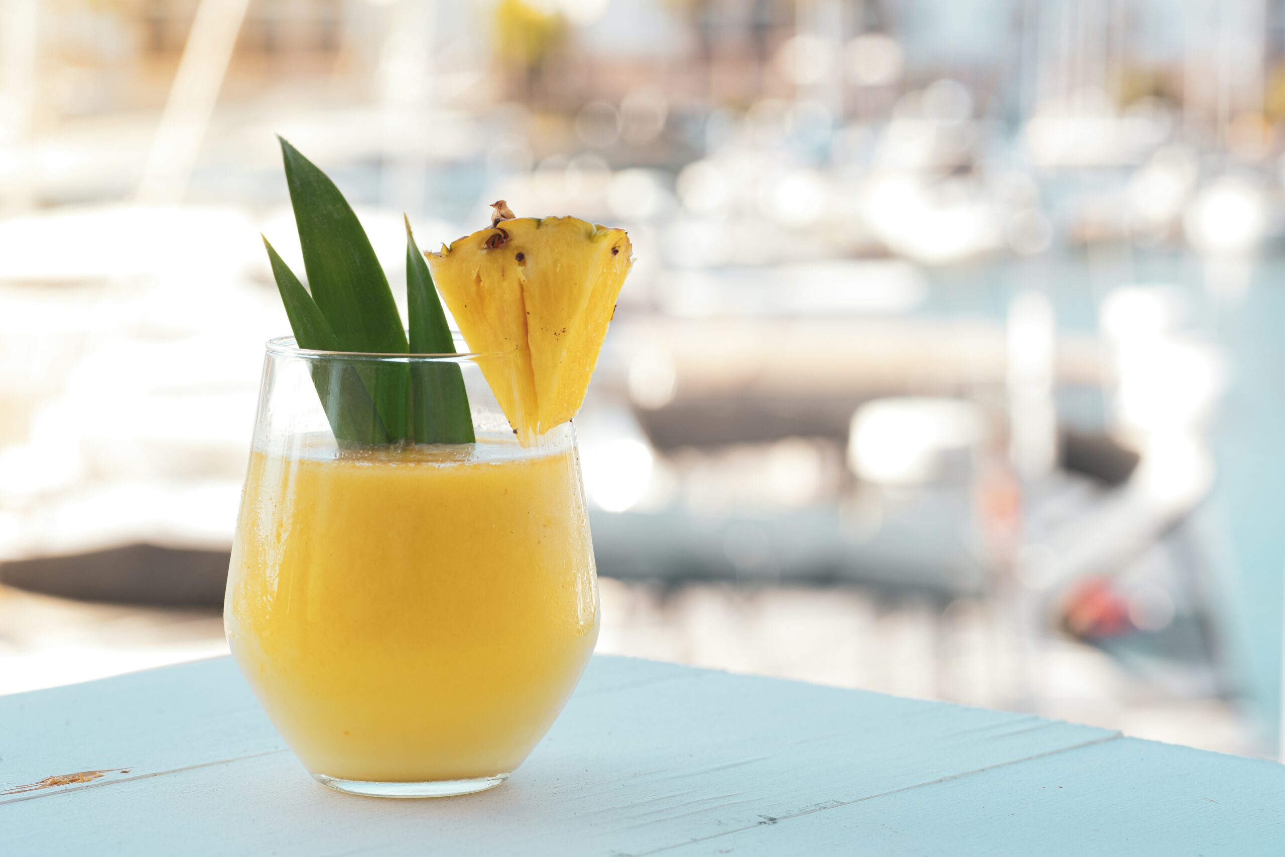Make this cortisol mocktail for yourself or your guests at a summer party. Pictured: pineapple juice