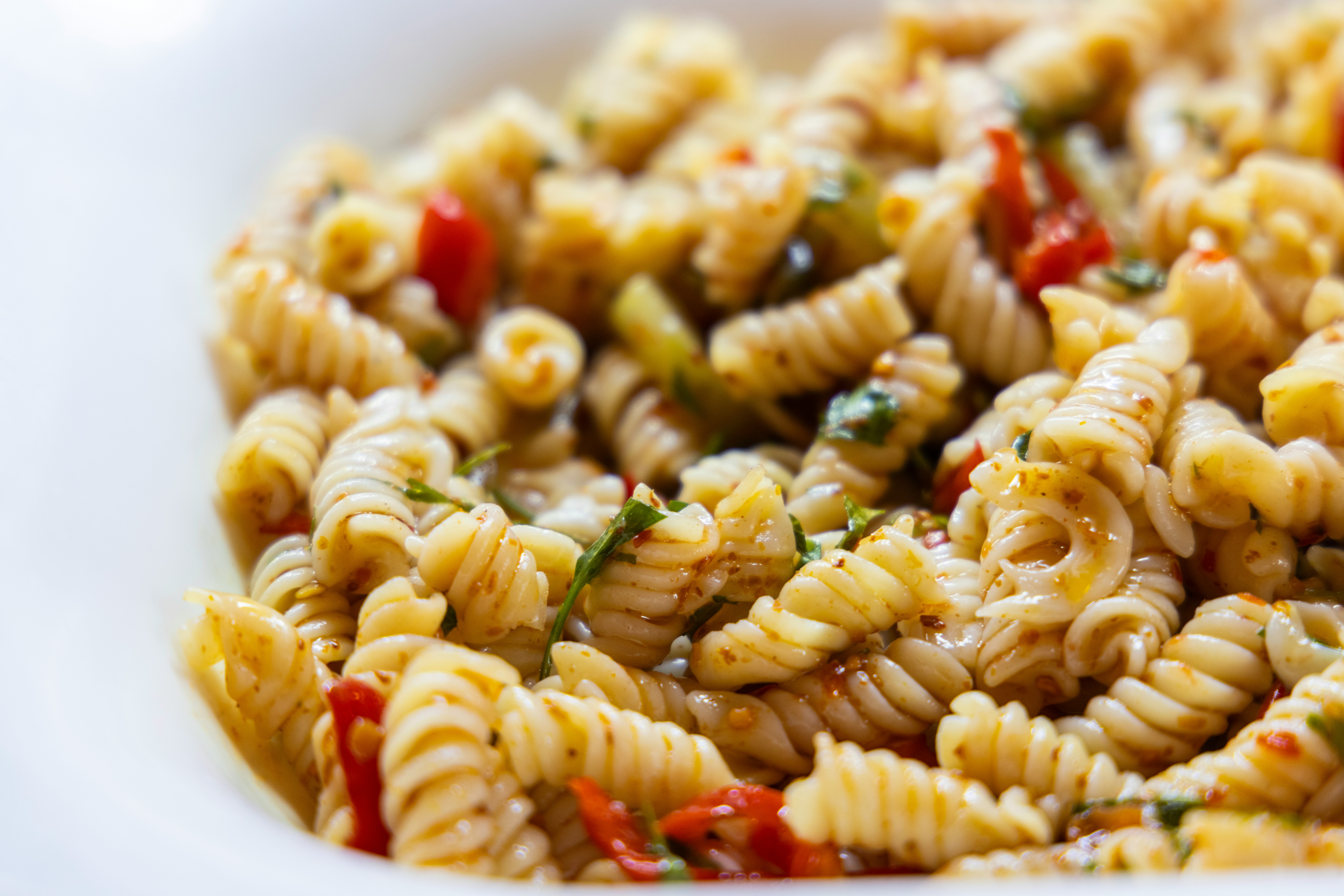 This light dinner idea is refreshing and perfect for a summer party gathering. Pictured: pasta salad