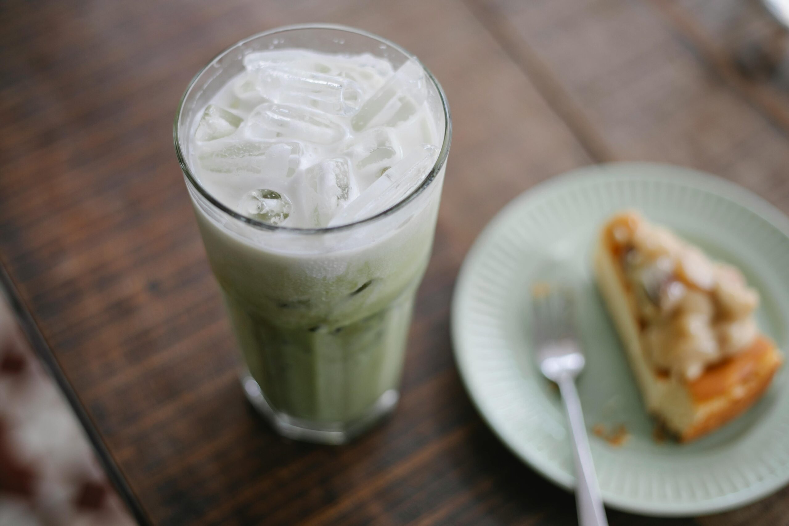 An iced matcha latte is a classic and easy matcha recipe. Pictured: An iced matcha latte