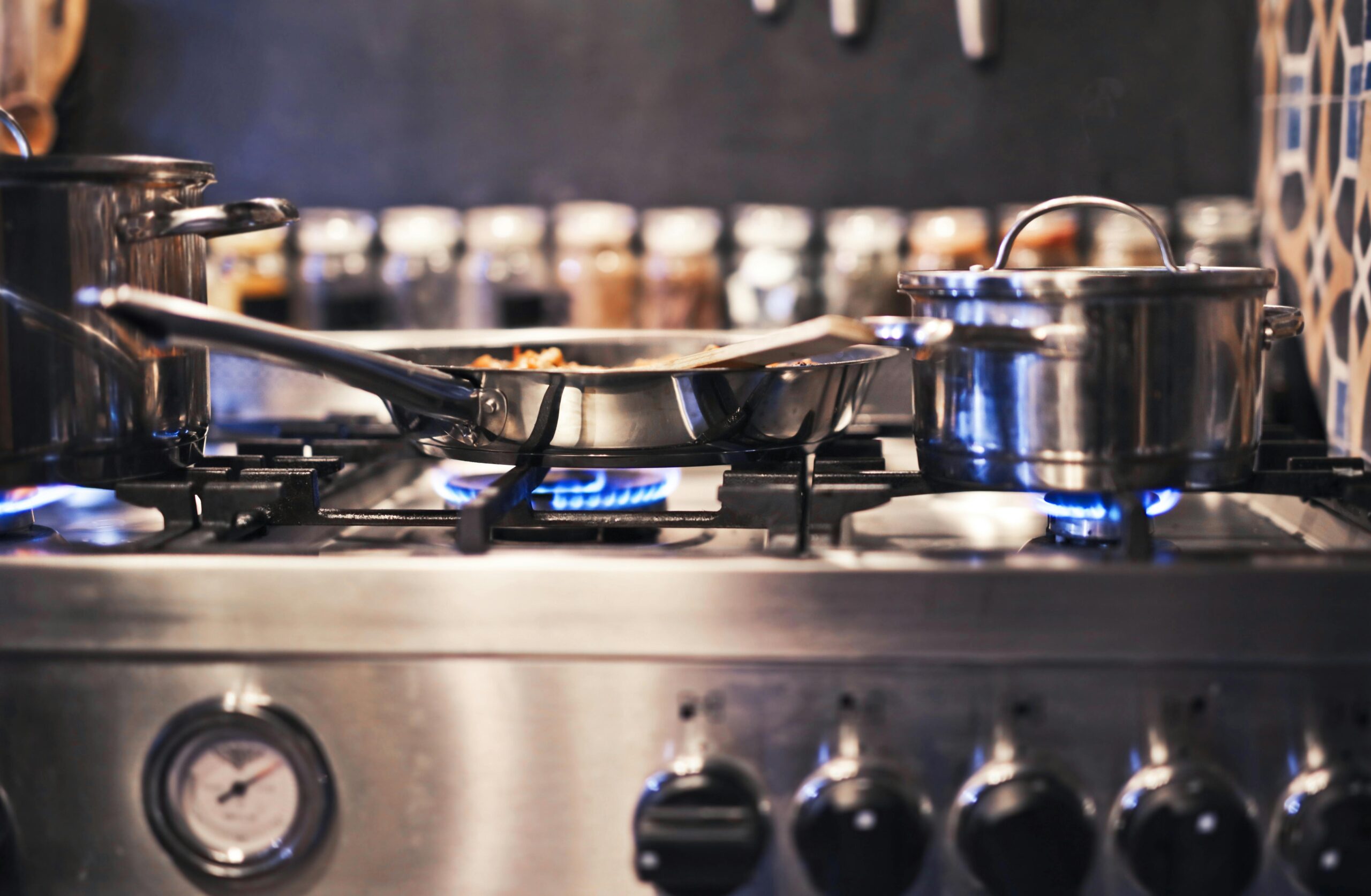 For stainless steel cookware, this set is one of the best for cooking on a gas stove. Pictured: stainless steel cookware on a stove