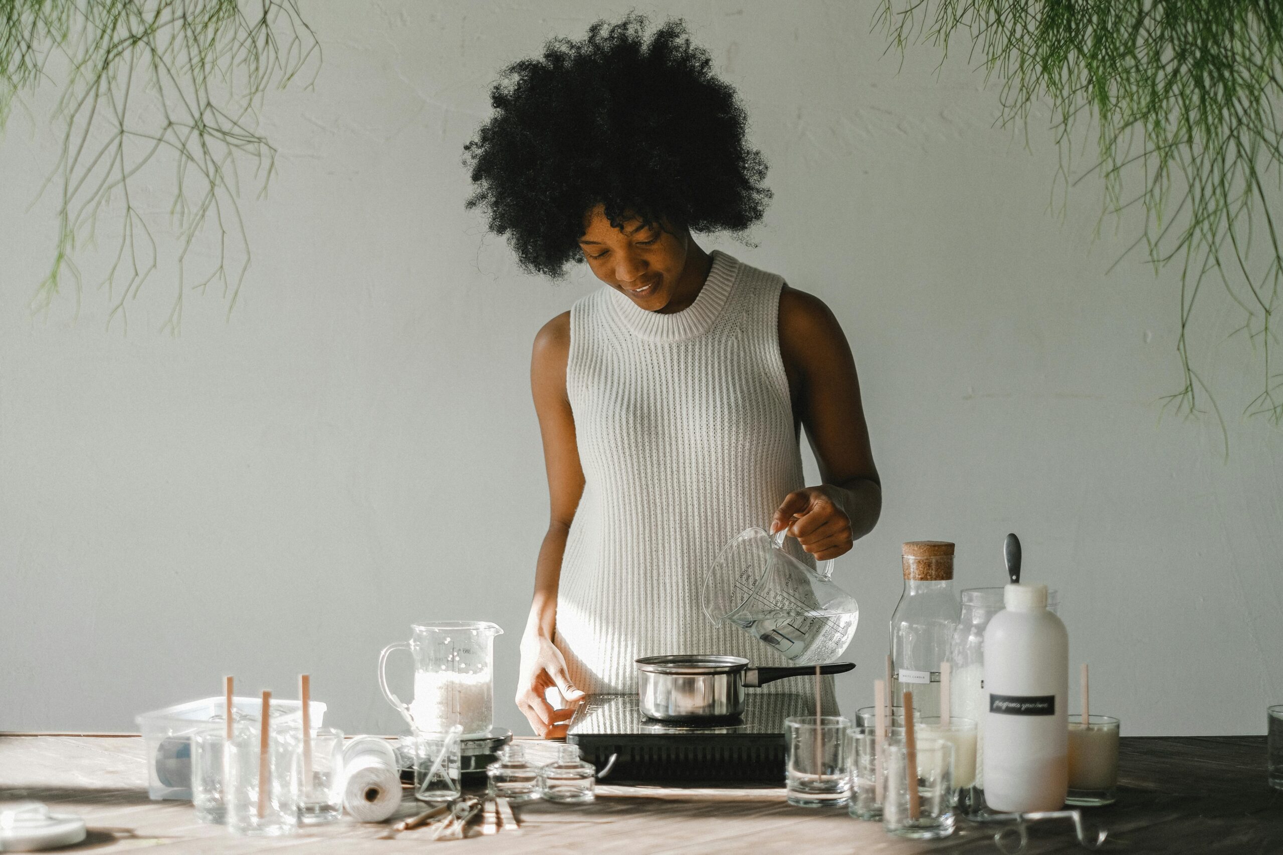 woman making candles