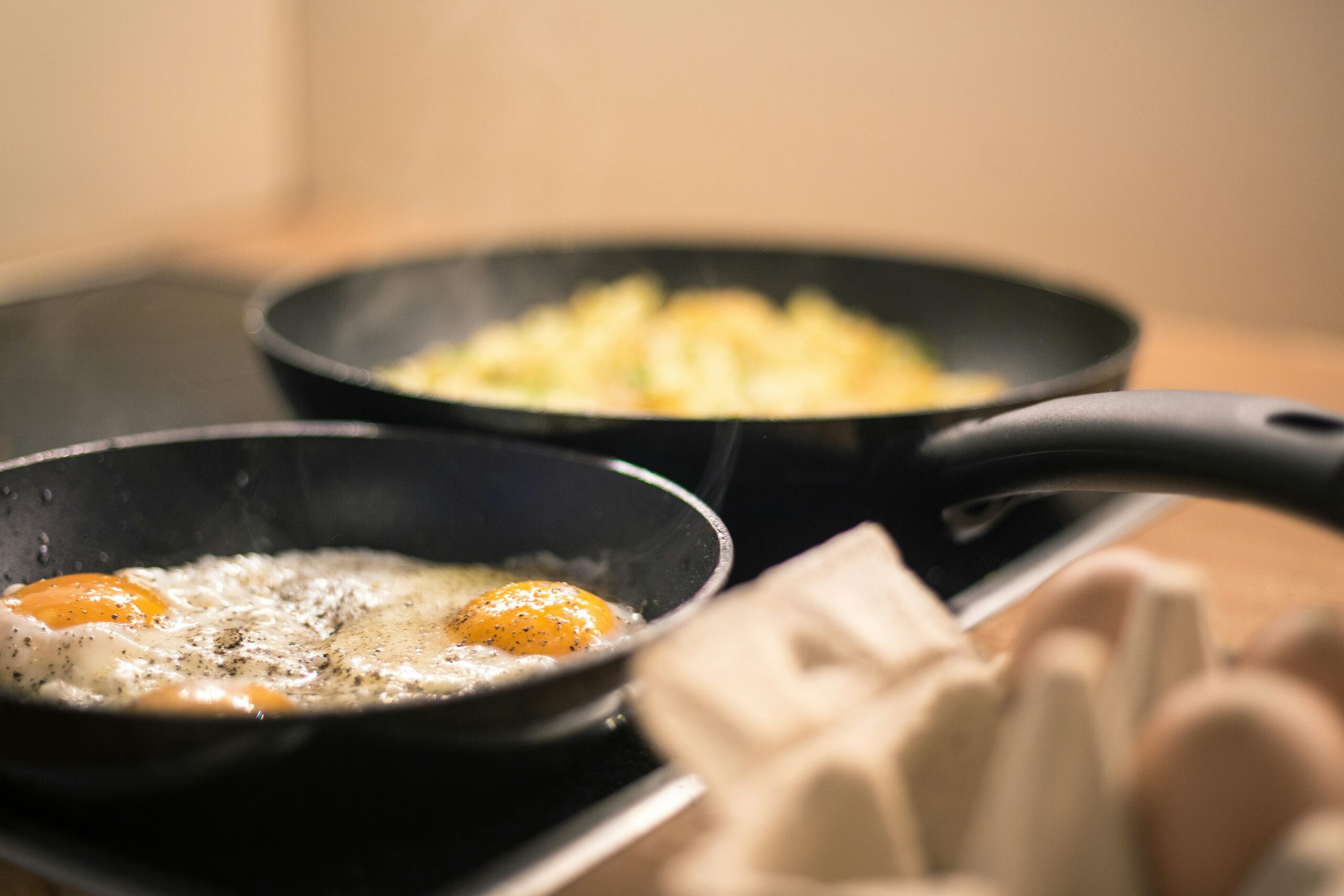 If you're looking for a set of multiple pots, pans and kitchen items, this cookware set is one of the best for gas stove cooking. Pictured: pans on a stove