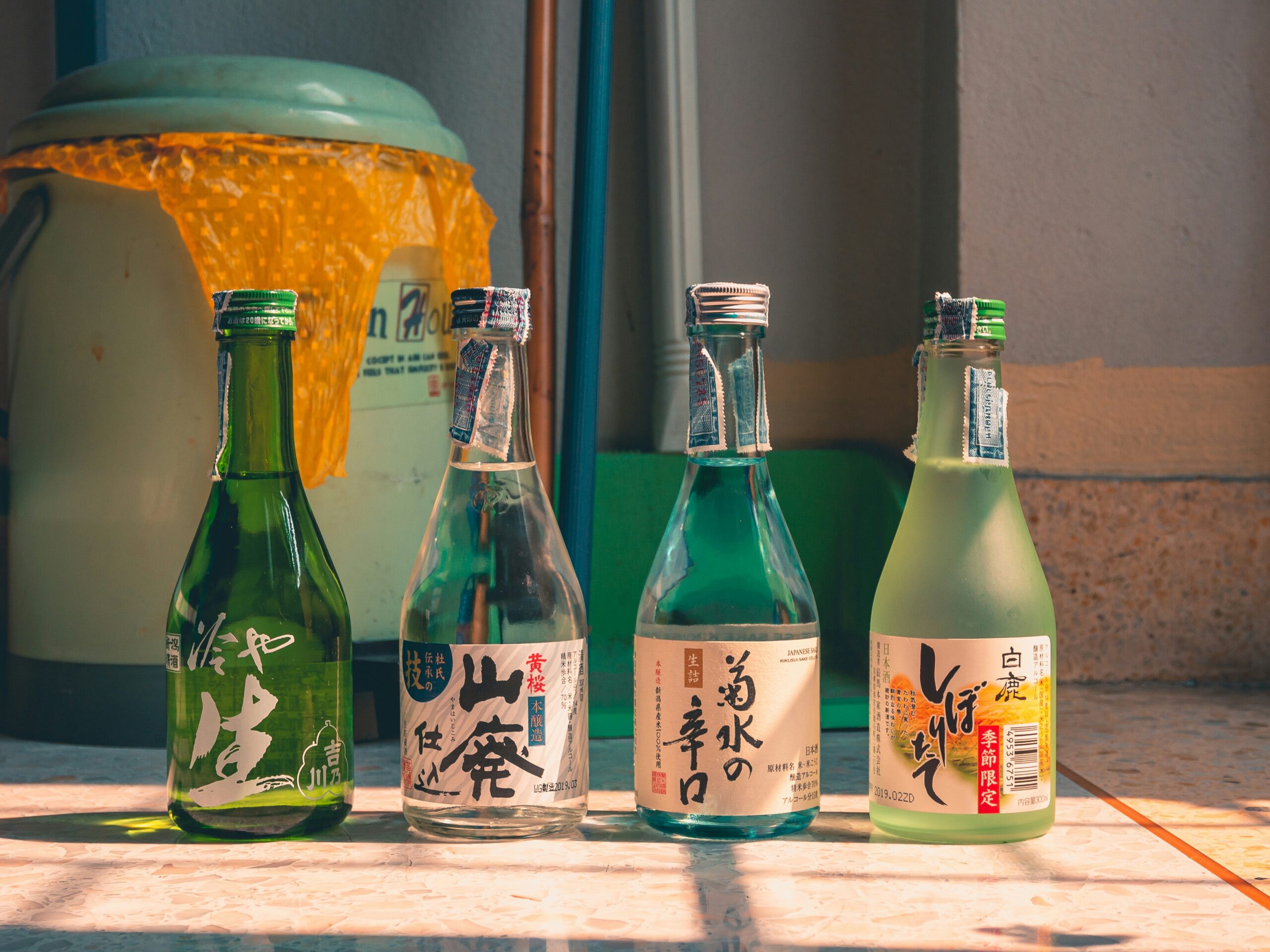 For a mirin substitute, try using sake for a similar taste and texture. Pictured: bottles of sake