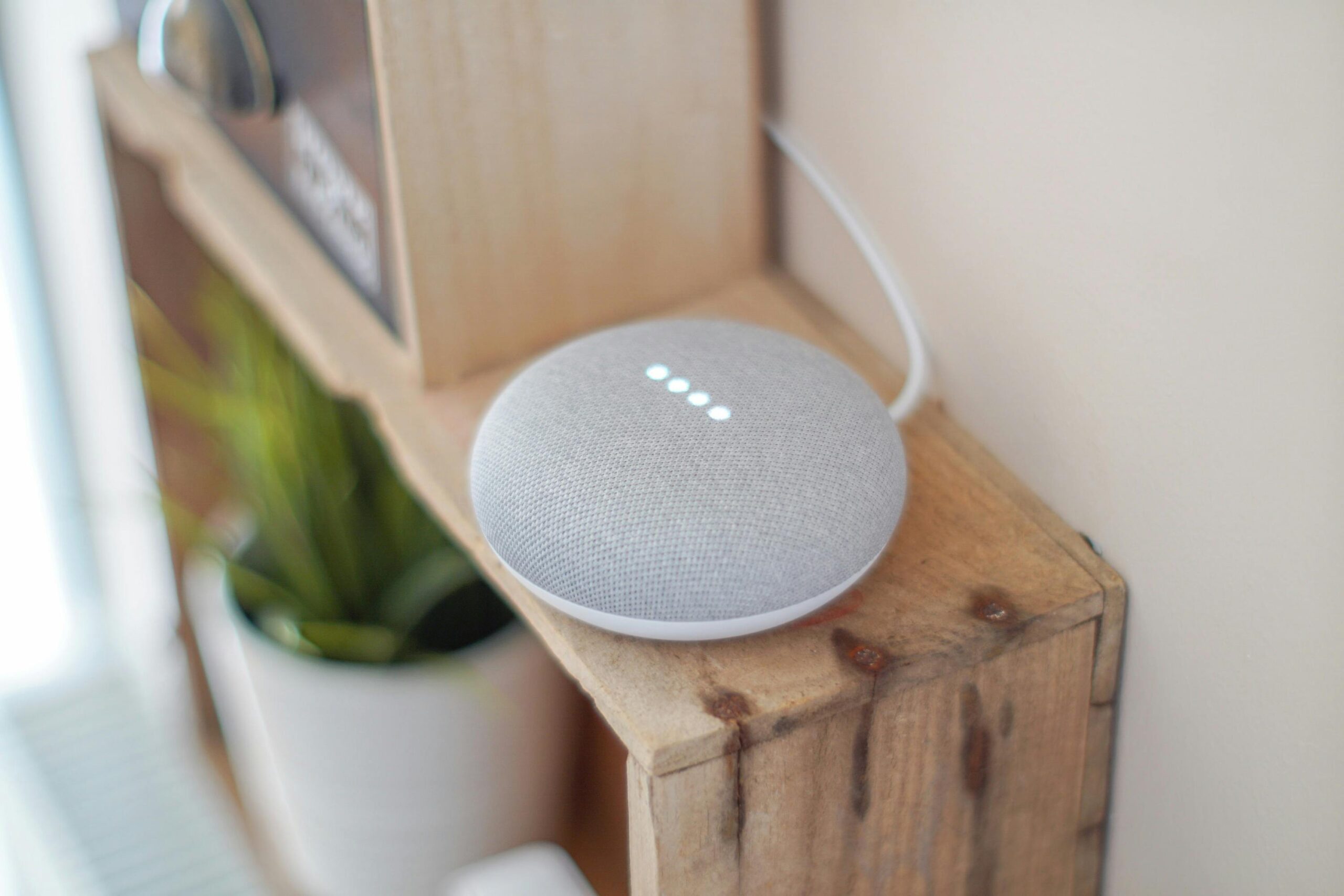 Round Grey Speaker On Brown Board