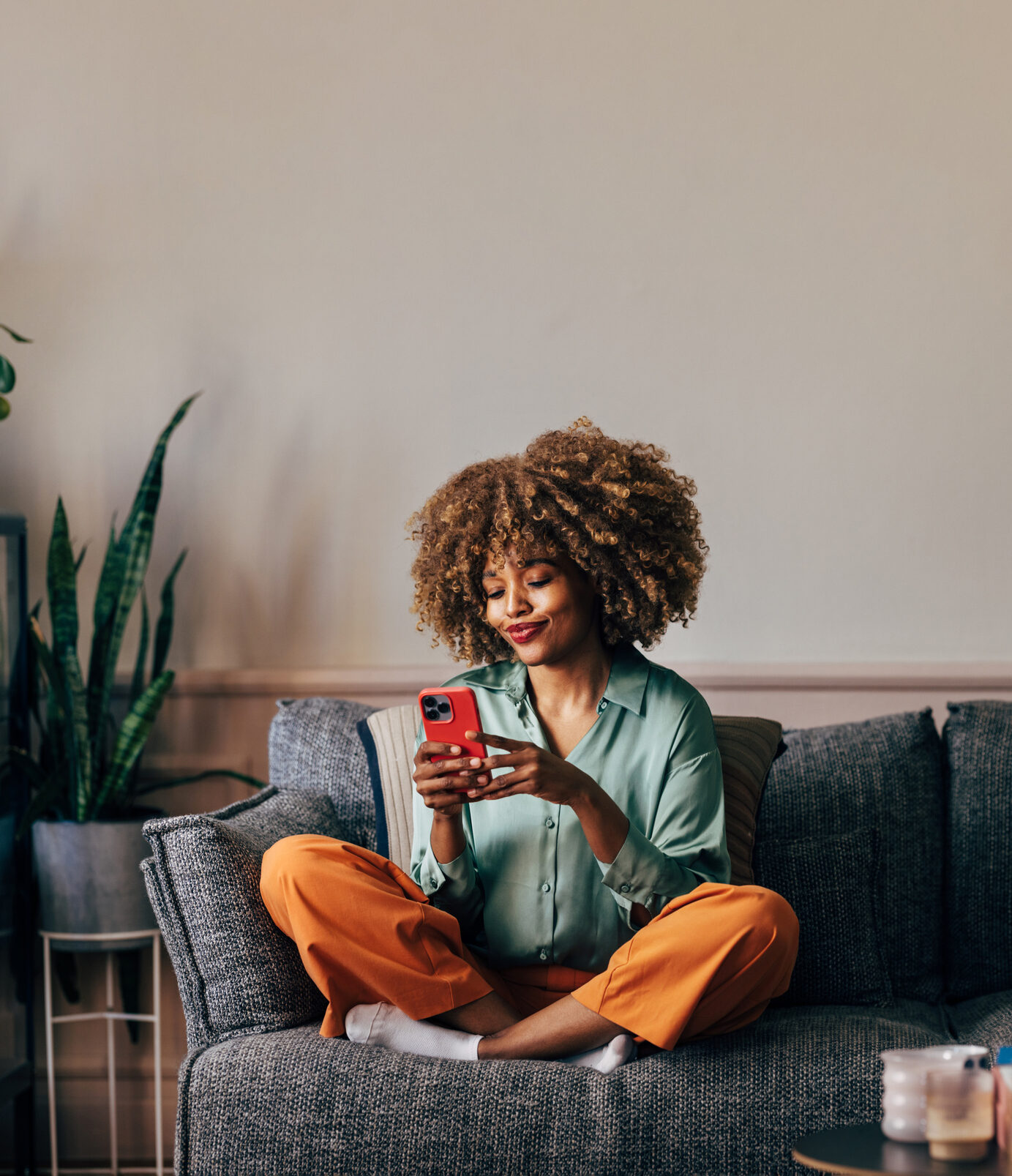 Female using phone and maintaining digital declutter