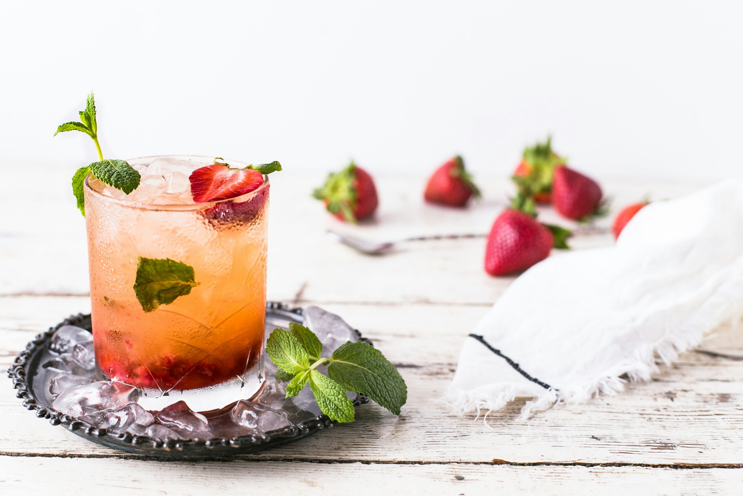 For a refreshing and sweet drink, make this strawberry basil skinny margarita recipe. Pictured: Strawberry basil drink