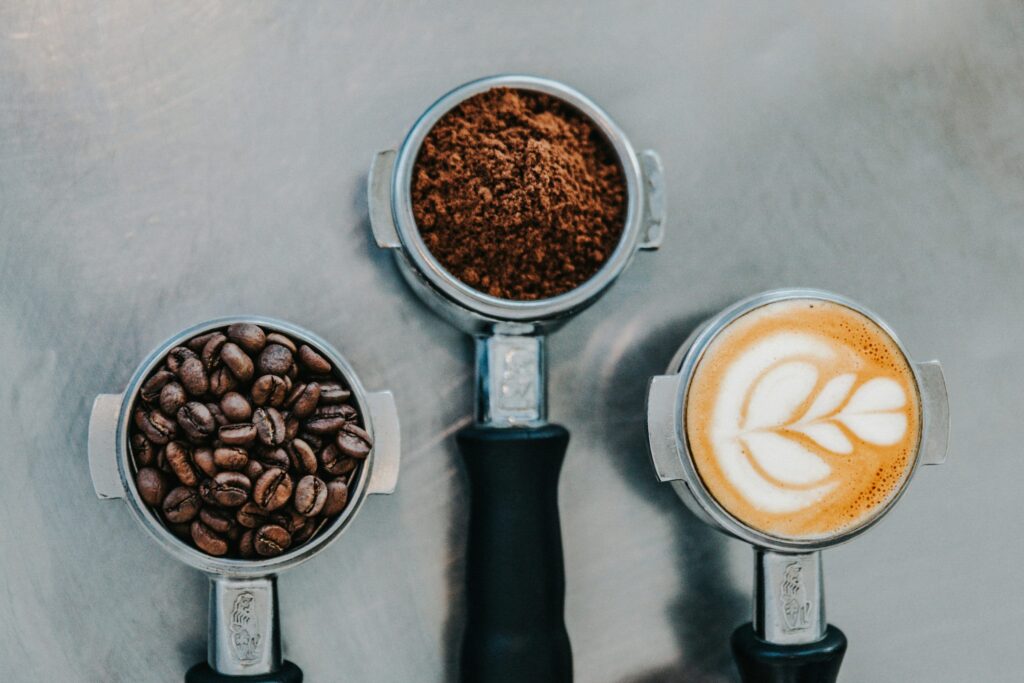 Low-Acid Coffee pictured: coffee beans and grinds