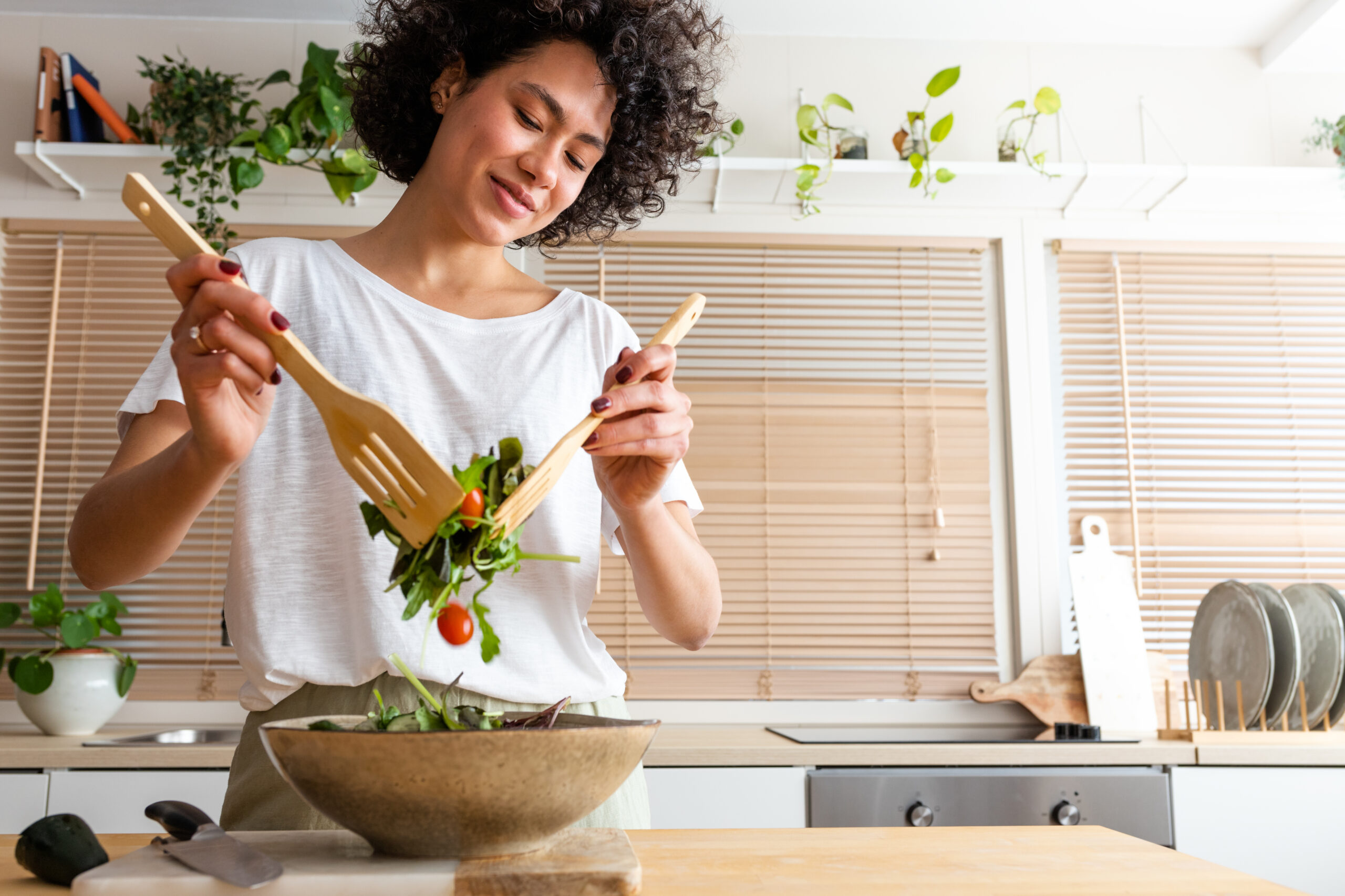 woman making salad