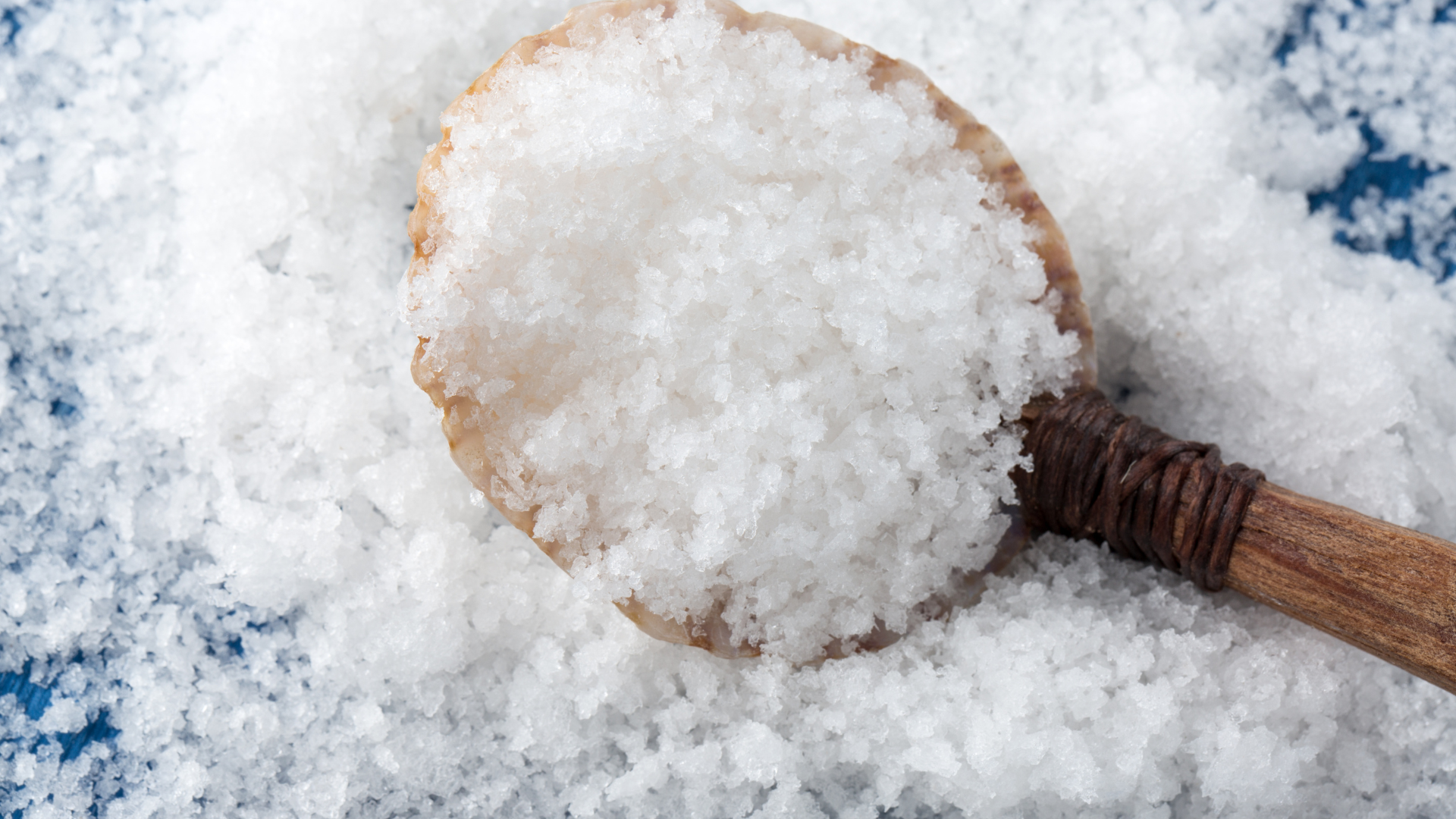 Fleur de sel in a spoon from seashell 